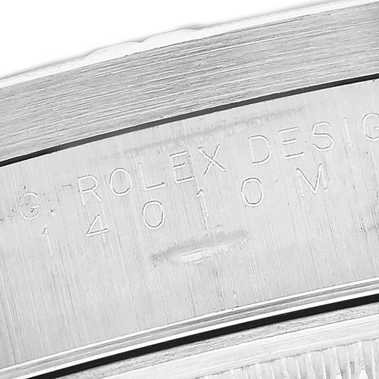 The image shows a close-up of the caseback engraving on a Rolex Air-King 14010M Men's Stainless Steel Black Dial 14010M Men's Stainless Steel Black Dial watch, featuring the model number 14010.