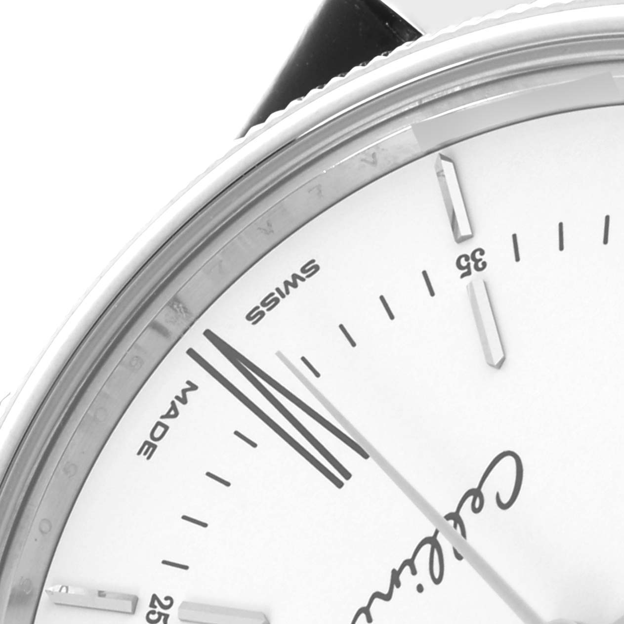 The image shows a partial view of the Rolex Cellini 50509 Men's White Gold White Dial 50509 Men's White Gold White Dial watch face, showcasing the dial, indices, and hands.