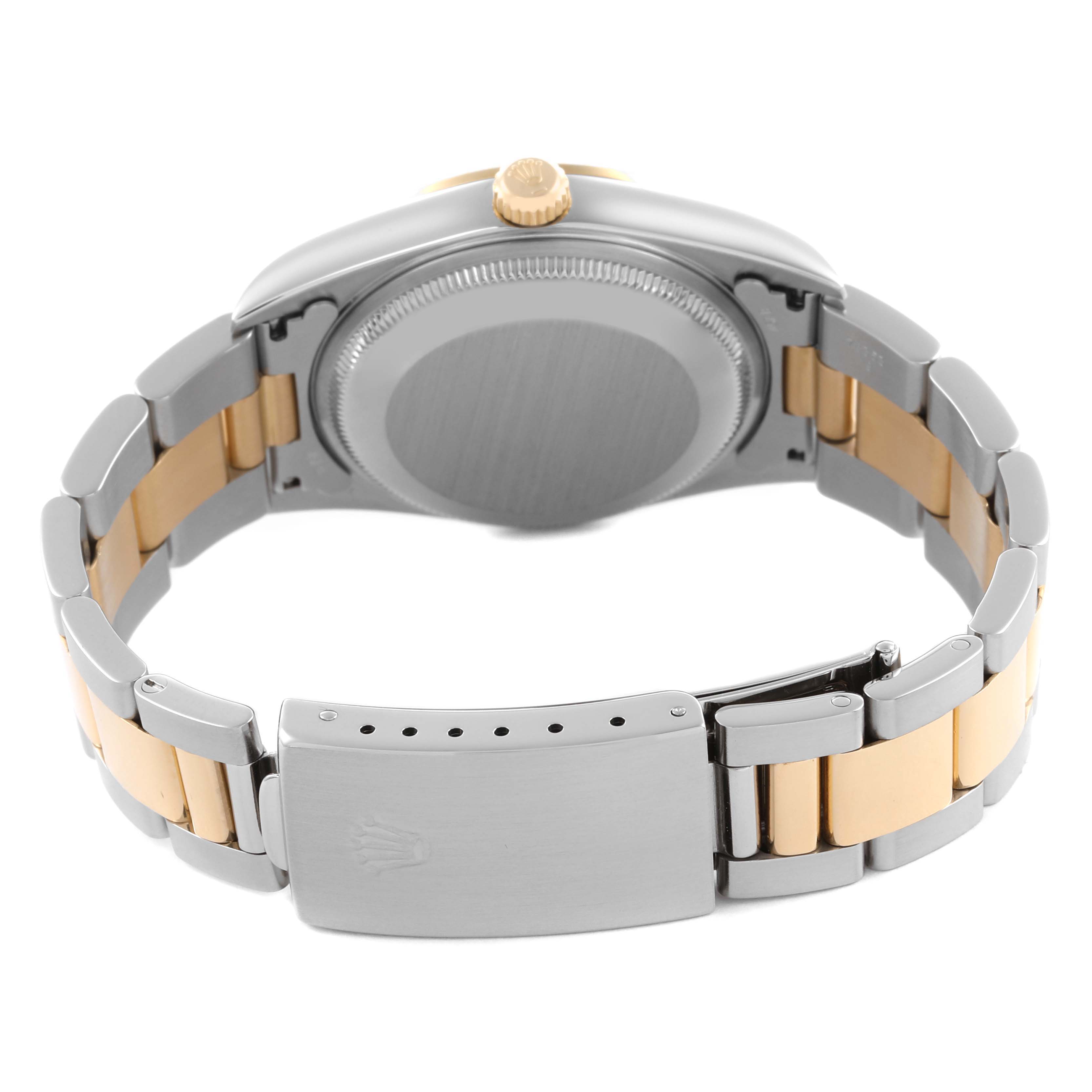 The image shows the back and bracelet of the Rolex Date 15223 Men
s Steel and Gold (two tone) Blue Dial 15223 Men
s Steel and Gold (two tone) Blue Dial, highlighting the two-tone band and clasp.