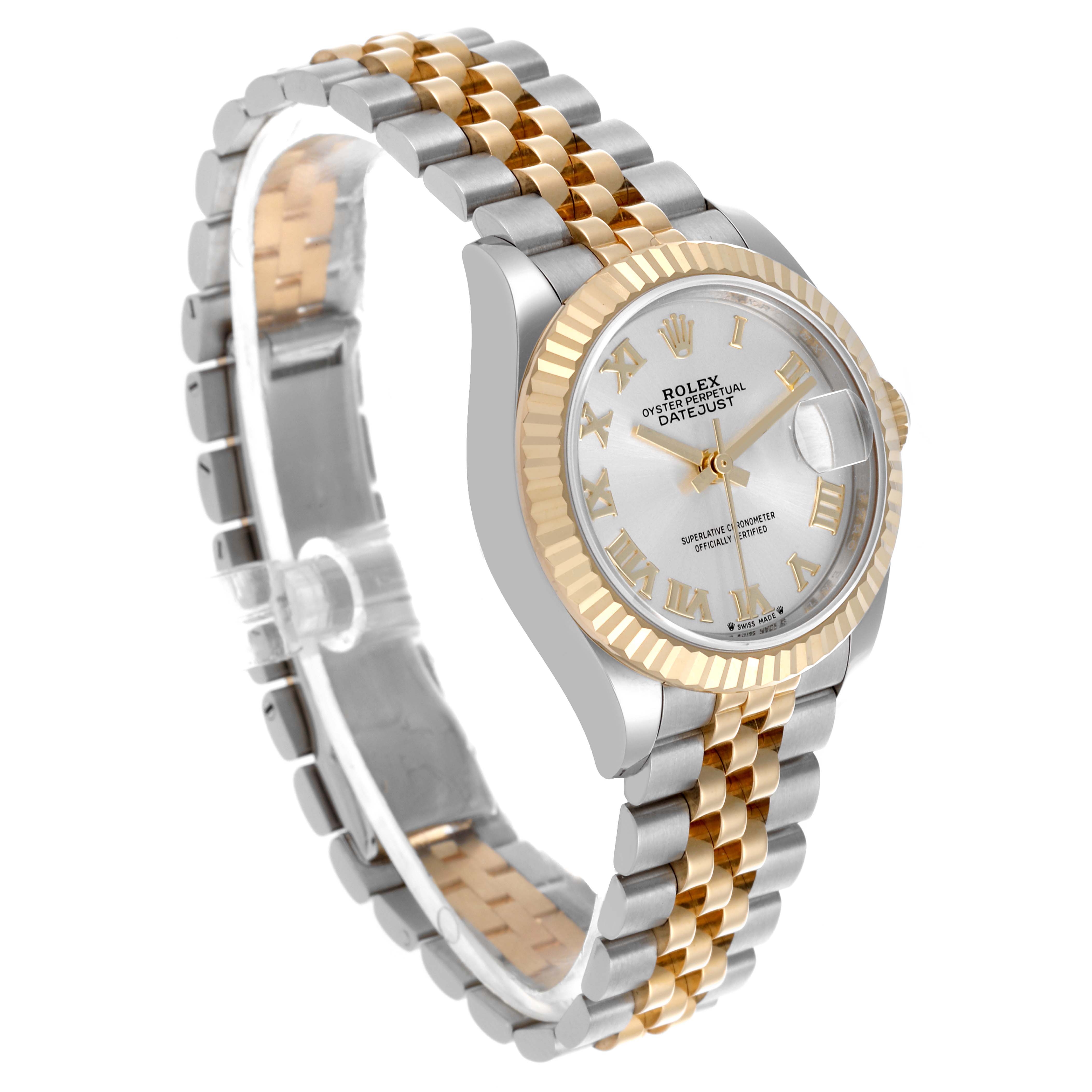 The Rolex Datejust 279173 Women's Steel and Gold (two tone) Silver Dial 279173 Women's Steel and Gold (two tone) Silver Dial watch is shown at a three-quarter angle, highlighting its dual-tone bracelet, fluted bezel, and dial.