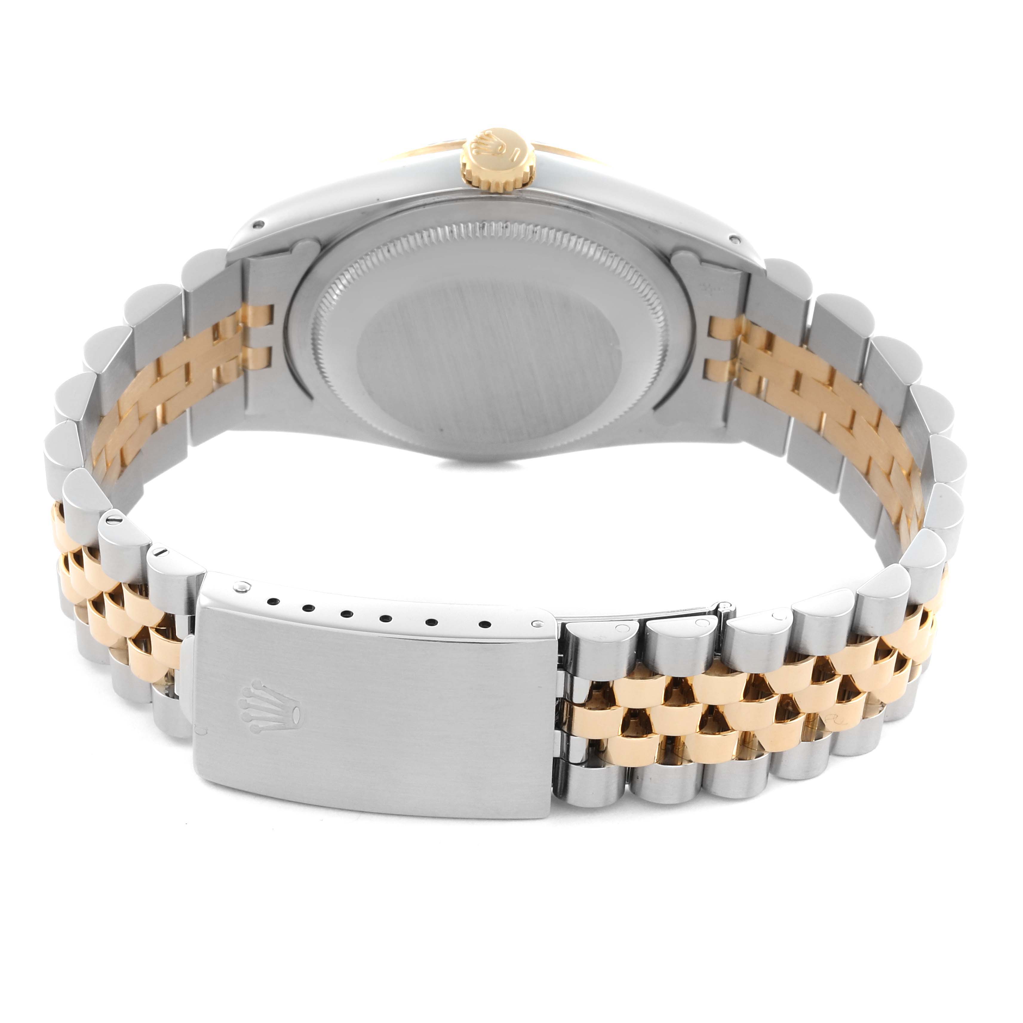 The image shows the back and clasp of a Rolex Datejust 16233 Men
s Steel and Gold (two tone) Champagne Dial 16233 Men
s Steel and Gold (two tone) Champagne Dial, featuring a two-tone jubilee bracelet and closed case back.