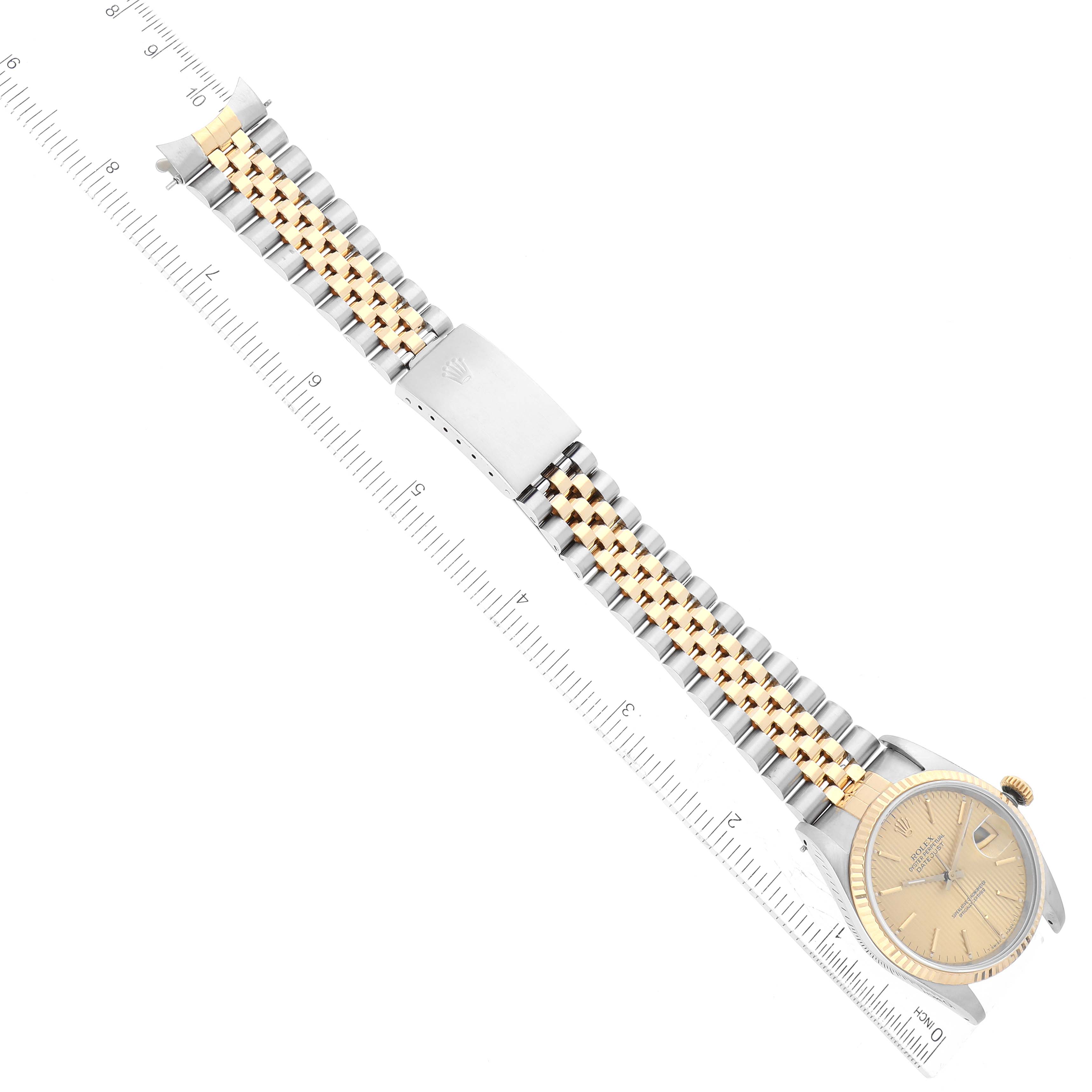 The image shows a top view of a Rolex Datejust 16233 Men's Steel and Gold (two tone) Champagne Dial 16233 Men's Steel and Gold (two tone) Champagne Dial watch with its dial, bezel, and two-tone jubilee bracelet.