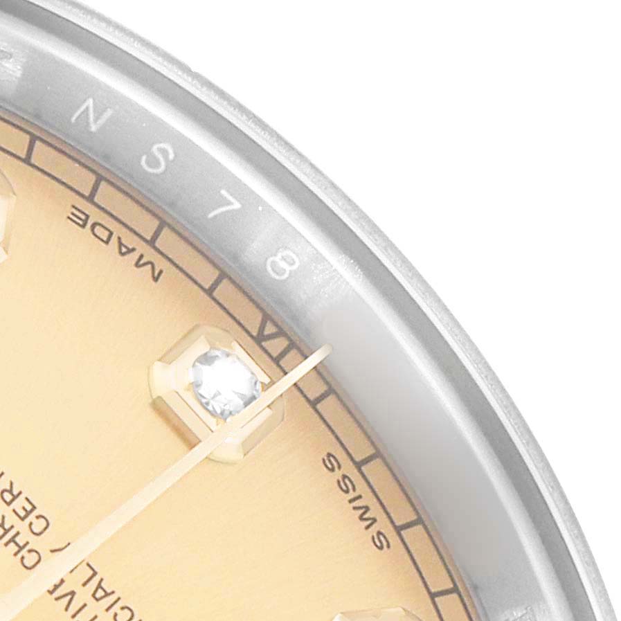 The image shows a close-up of the Rolex Datejust 41 116333 Men's Steel and Gold (two tone) Champagne Dial dial, highlighting the markers, part of the bezel, and lettering.