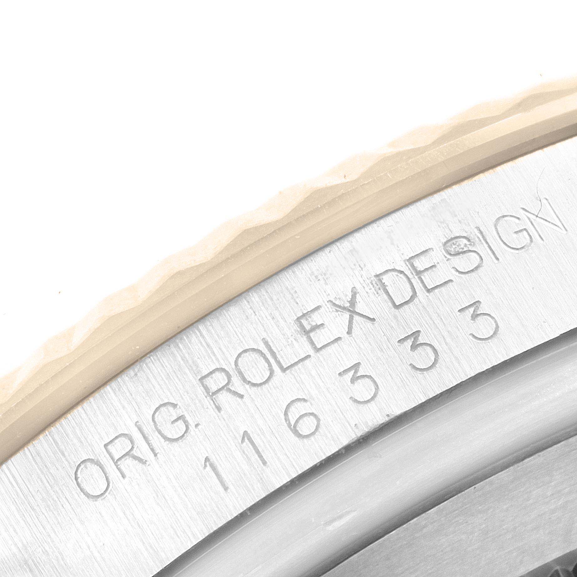The image shows a close-up of the side engraving on a Rolex Datejust 41 116333 Men's Steel and Gold (two tone) Grey Dial 116333 Men's Steel and Gold (two tone) Grey Dial bezel.