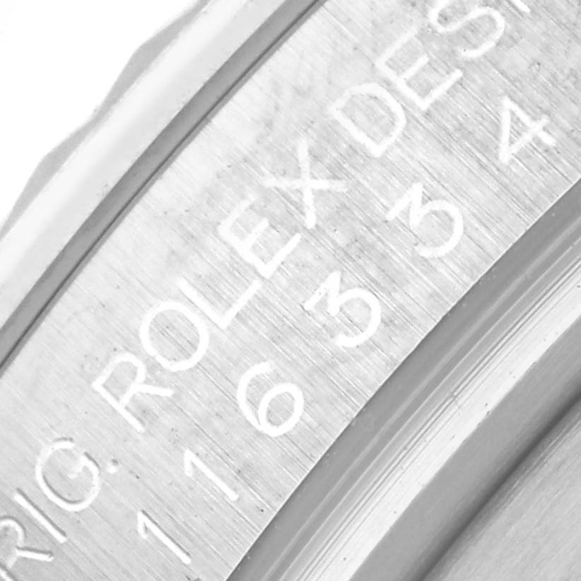 The image shows the engraved side of the case back of a Rolex Datejust 41 116334 Men's Stainless Steel White Dial 116334 Men's Stainless Steel White Dial watch.