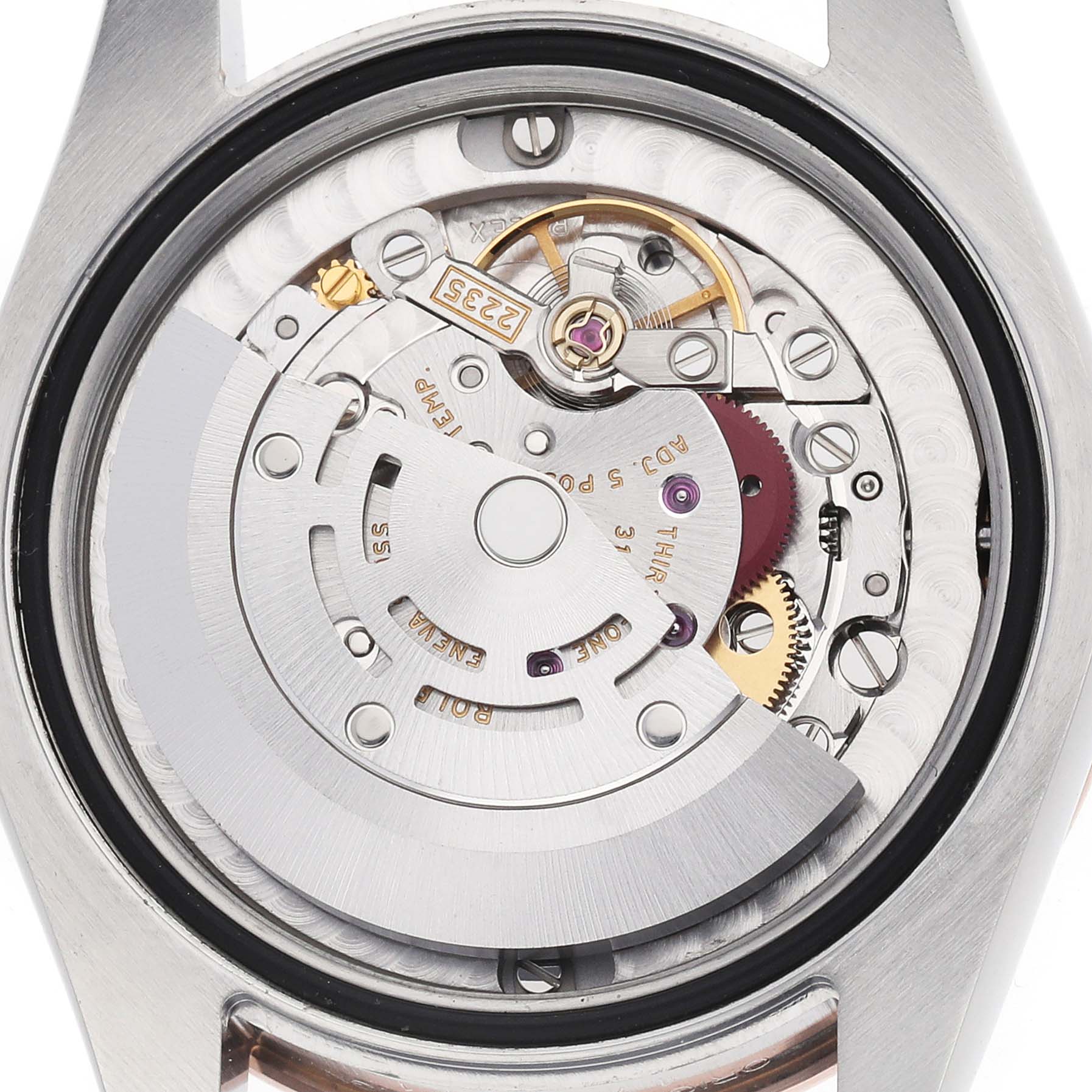 The image shows the movement and inner mechanisms of a Rolex Mid-Size 178341 Women's Steel and Gold (two tone) White Dial watch from a back angle.