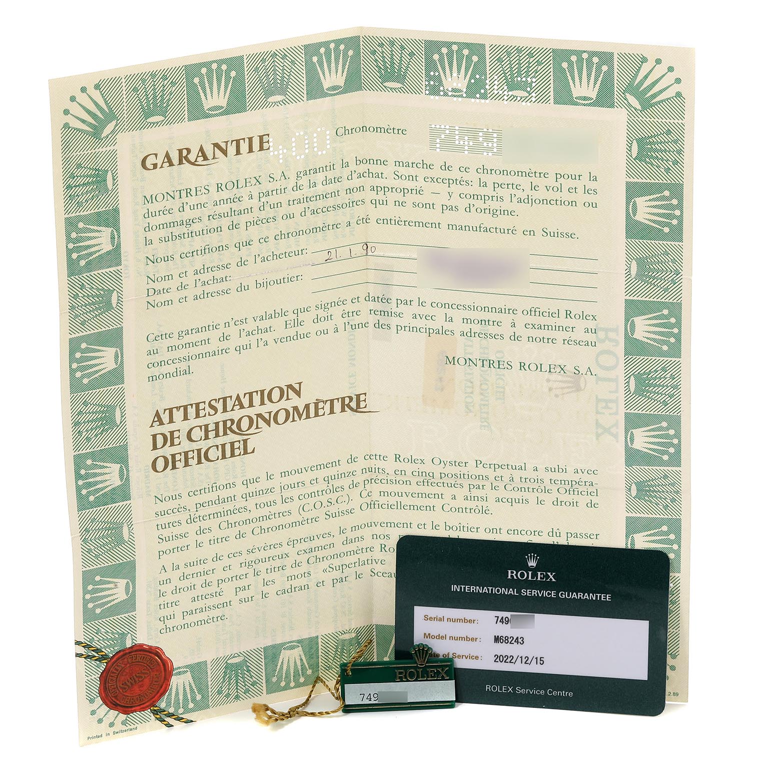 The image shows a warranty certificate and service guarantee card for a Rolex Mid-Size 68243 Women
s Steel and Gold (two tone) Champagne Dial 68243 Women
s Steel and Gold (two tone) Champagne Dial model watch.