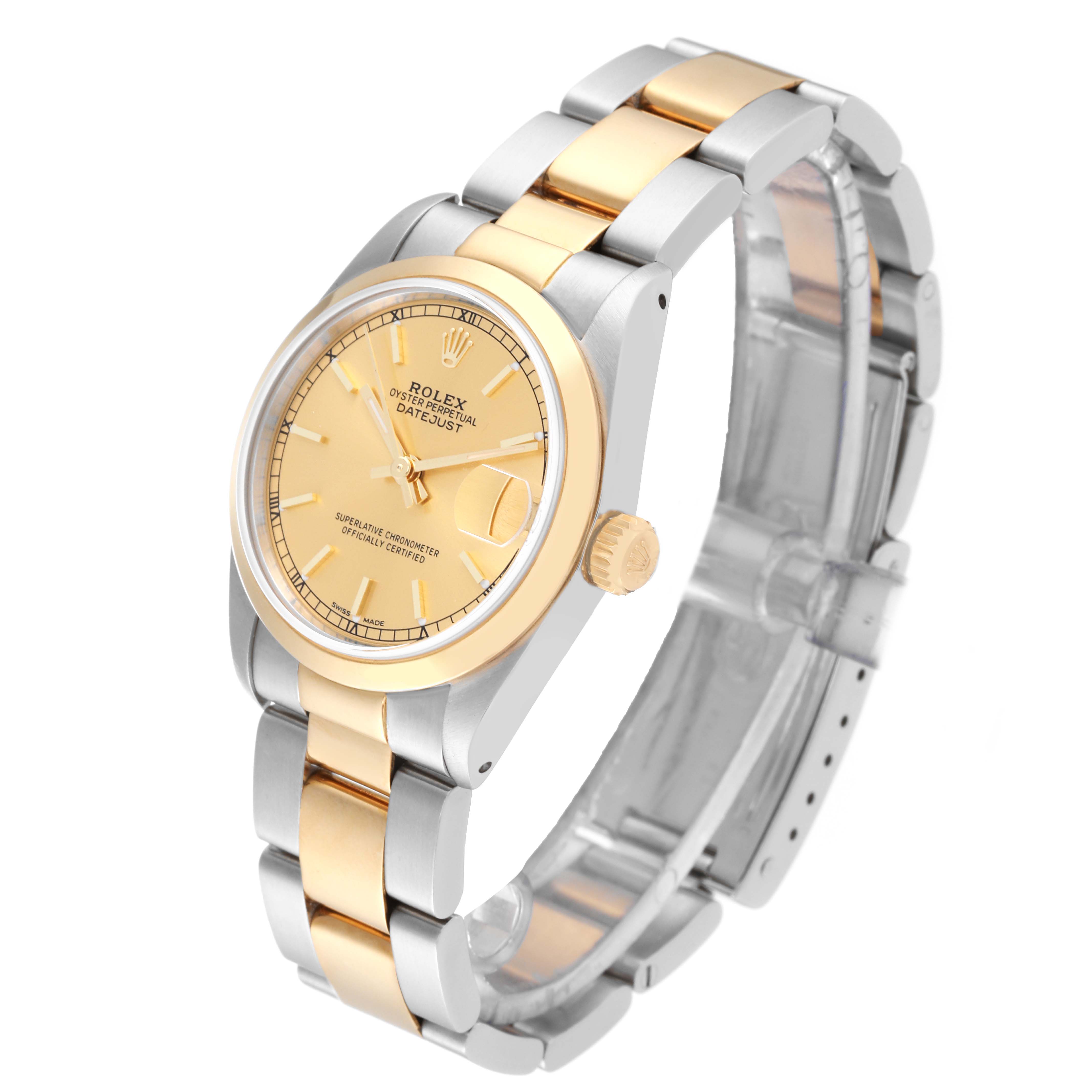 This image shows a Rolex Mid-Size 68243 Women
s Steel and Gold (two tone) Champagne Dial 68243 Women
s Steel and Gold (two tone) Champagne Dial Datejust watch with a gold and silver bracelet, viewed at an angled side perspective.