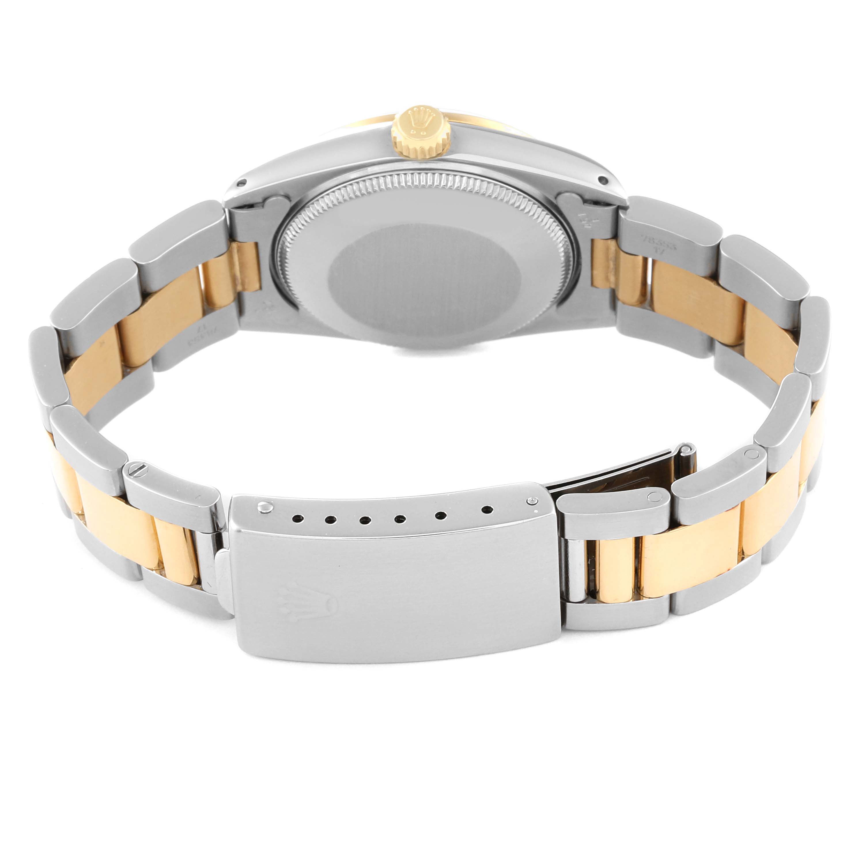 The back view of a Mid-Size Rolex watch shows the clasp, bracelet, crown, and case back.