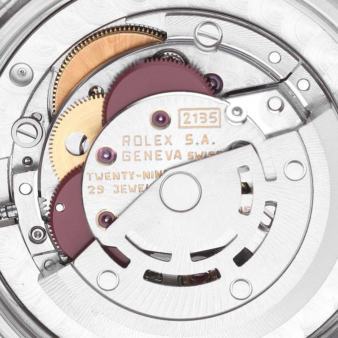 This image shows the internal movement mechanism of a Rolex Mid-Size 68243 Women
s Steel and Gold (two tone) Champagne Dial 68243 Women
s Steel and Gold (two tone) Champagne Dial model watch, focusing on the gears and rotor.