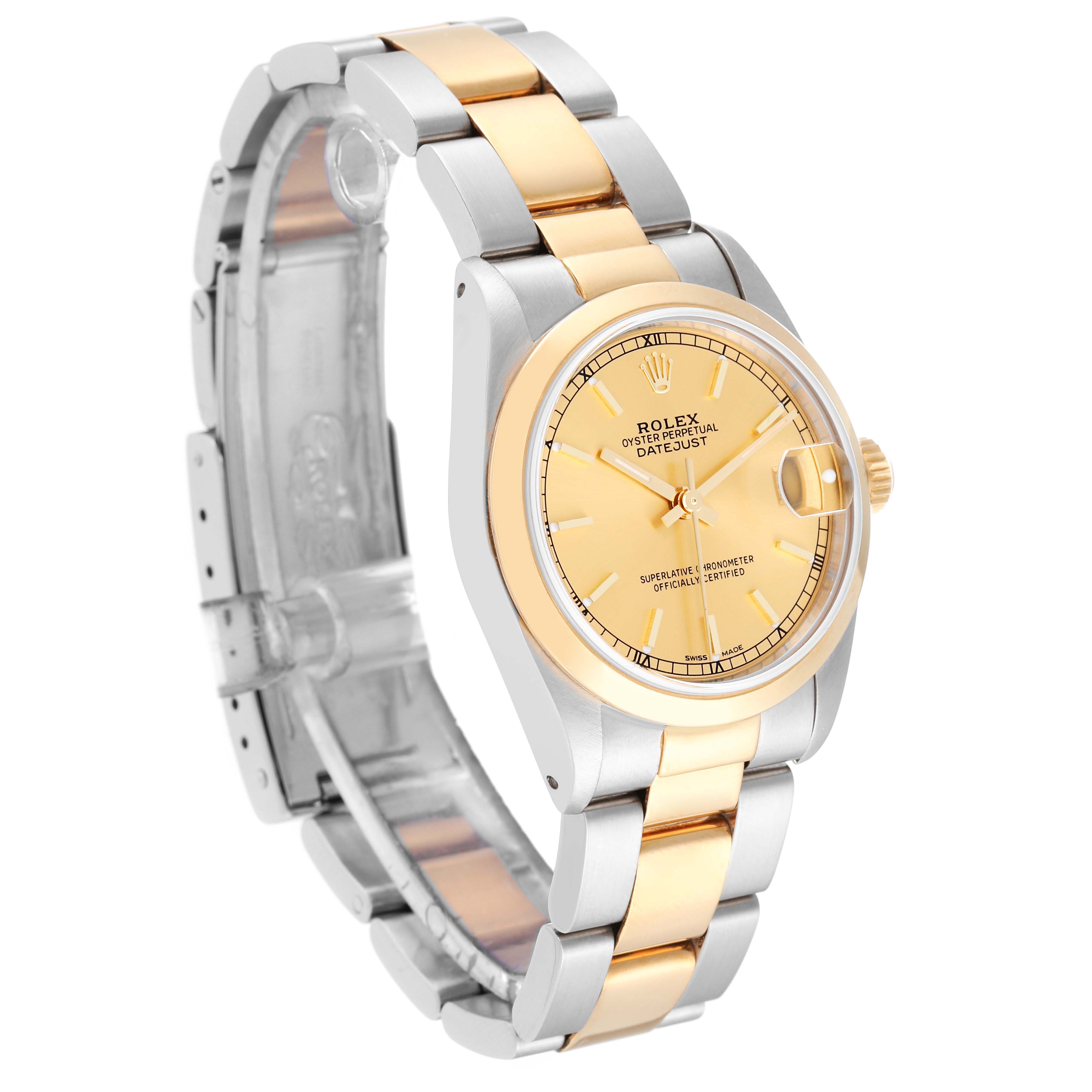 The Rolex Mid-Size 68243 Women
s Steel and Gold (two tone) Champagne Dial 68243 Women
s Steel and Gold (two tone) Champagne Dial Datejust watch is shown at a slight angled view, highlighting the face, bezel, and two-tone bracelet.