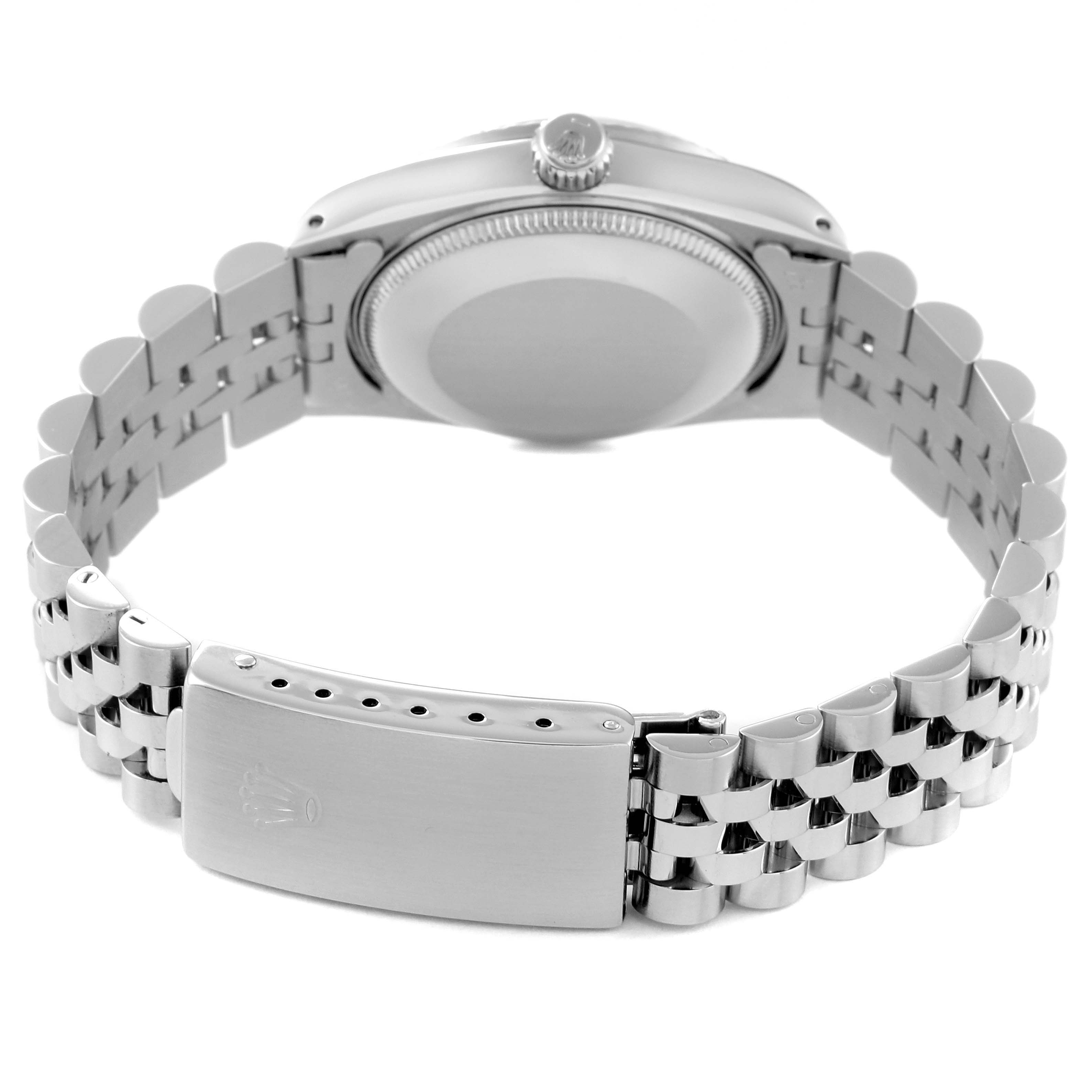 This image shows the back view of a Mid-Size Rolex watch, highlighting the case back, crown, and bracelet clasp.