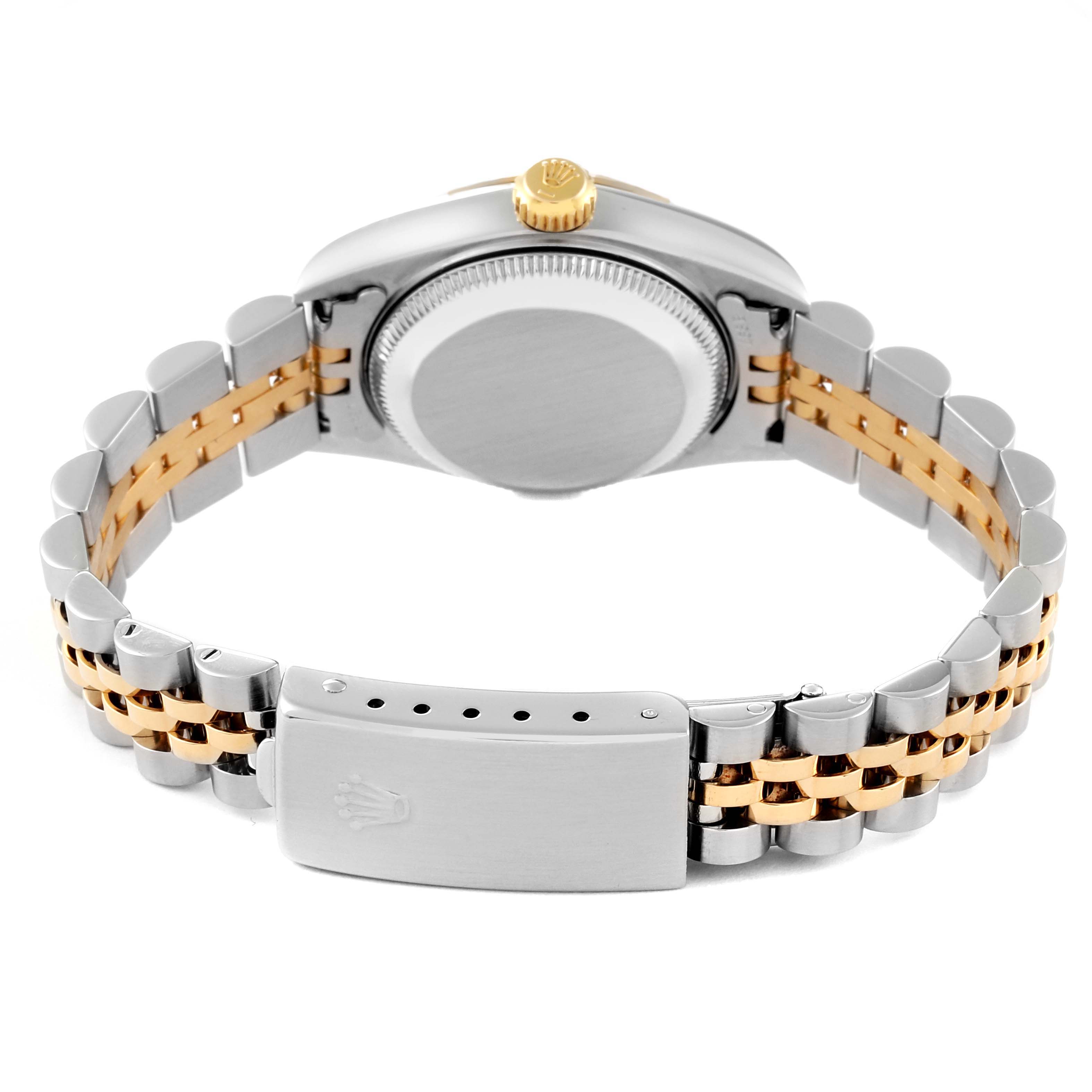 This image shows the back of a Rolex Datejust 79173 Women's Steel and Gold (two tone) Mother of Pearl Dial 79173 Women's Steel and Gold (two tone) Mother of Pearl Dial watch, highlighting its clasp, bracelet, and case back.