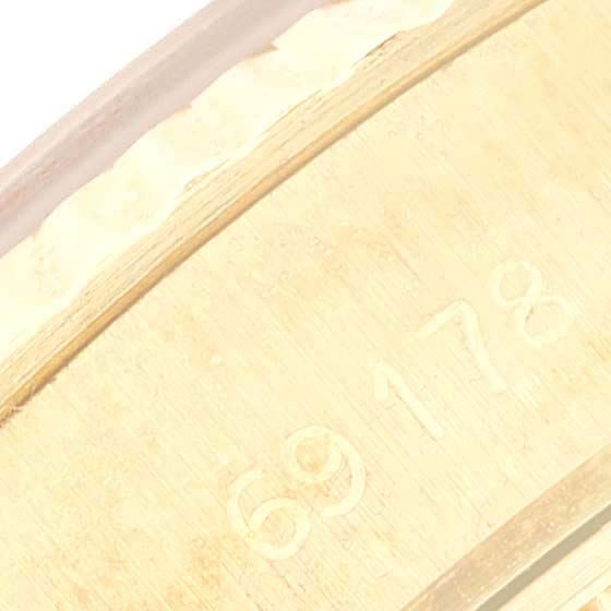 This image shows a close-up of the case side of a Rolex President 69178 Women's Yellow Gold Champagne Dial 69178 Women's Yellow Gold Champagne Dial model, highlighting the engraved model number 69178.