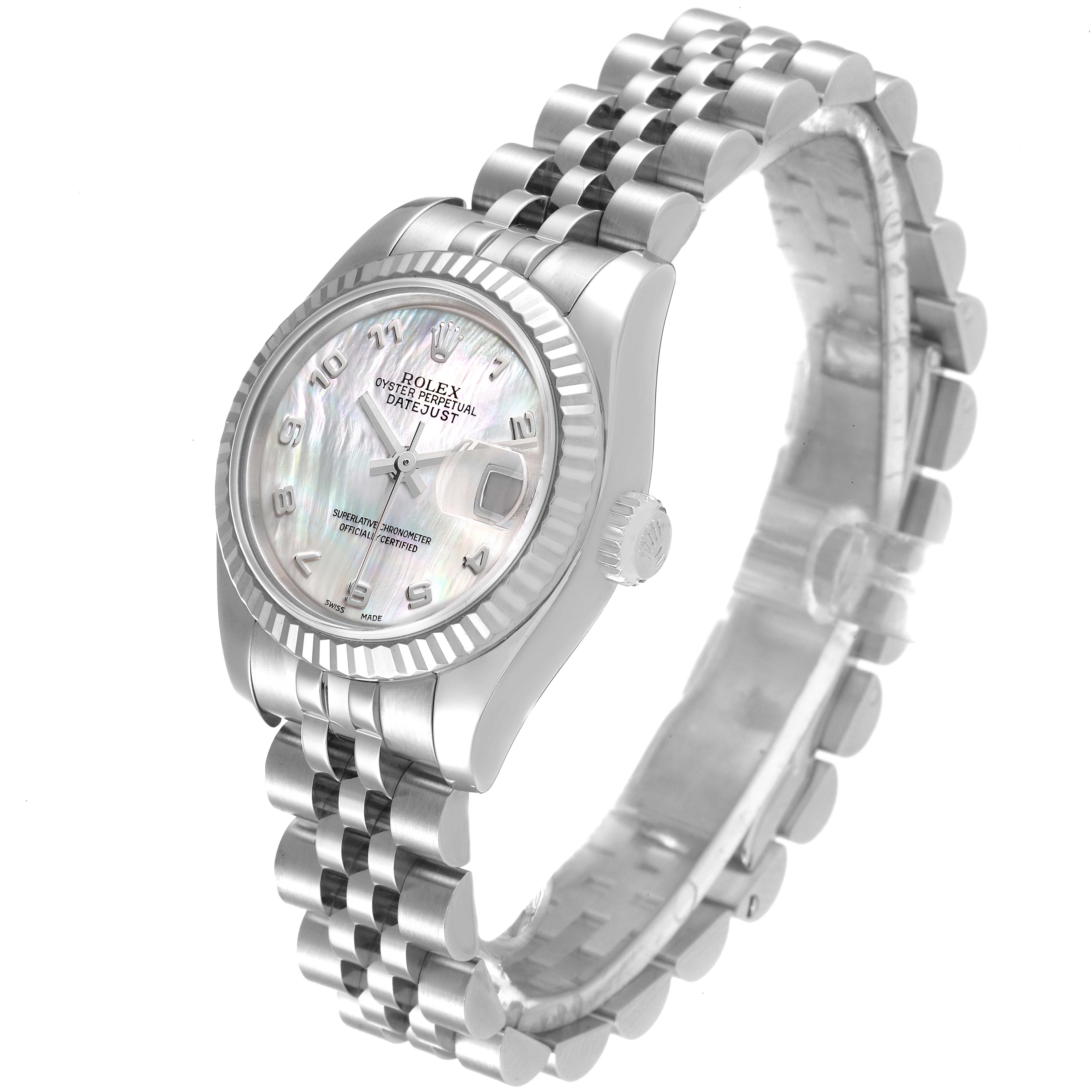 The Rolex Datejust 179174 Women's Stainless Steel Mother of Pearl Dial 179174 Women's Stainless Steel Mother of Pearl Dial watch is shown at an oblique angle, highlighting its face, dial, bezel, crown, and Jubilee bracelet.