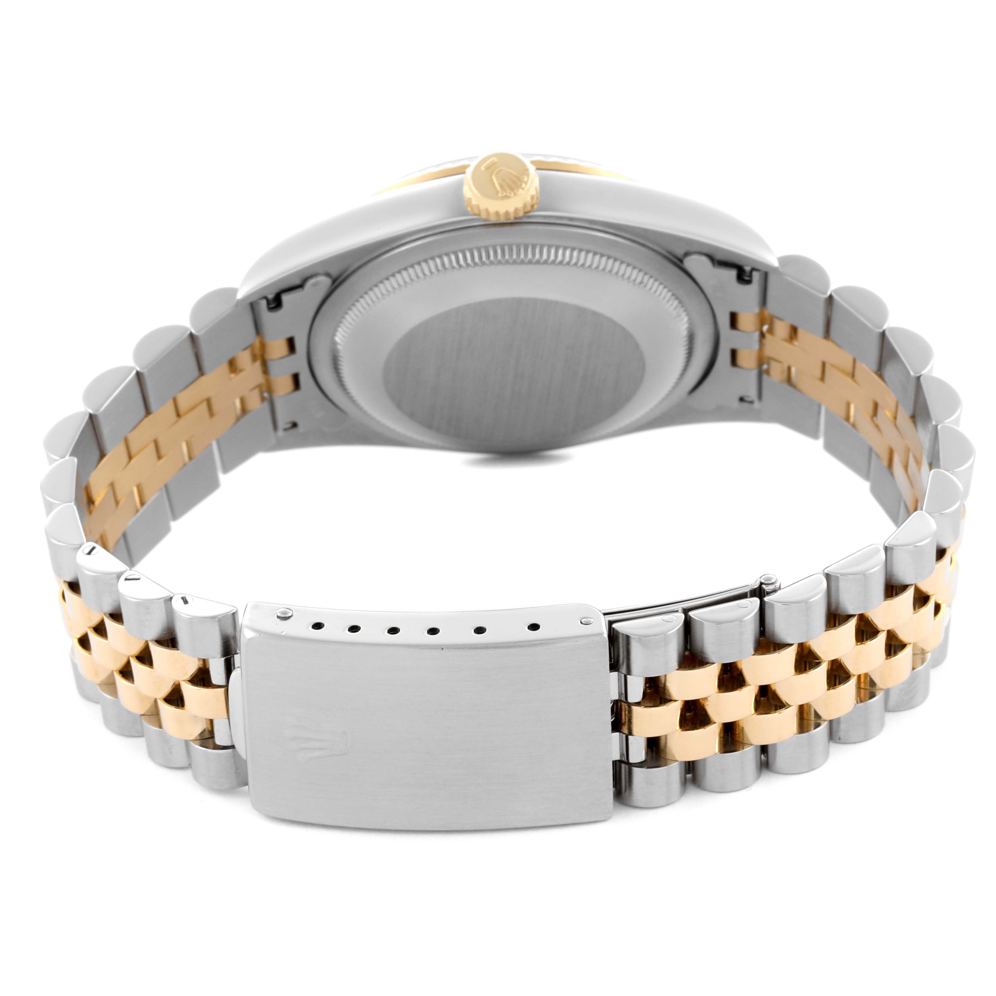 The image shows the back case and two-tone bracelet of a Rolex Datejust 16233 Men's Steel and Gold (two tone) Black Dial 16233 Men's Steel and Gold (two tone) Black Dial watch at an angled rear view.