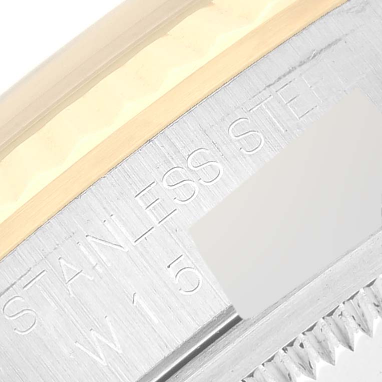 Close-up angle showing the stainless steel part and edge of the bezel of the Rolex Datejust 16233 Men's Steel and Gold (two tone) Silver Dial 16233 Men's Steel and Gold (two tone) Silver Dial model.