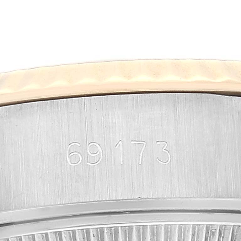 This image shows the model number 69173 on the side of a Rolex Datejust 69173 Women's Steel and Gold (two tone) Champagne Dial 69173 Women's Steel and Gold (two tone) Champagne Dial watch case.