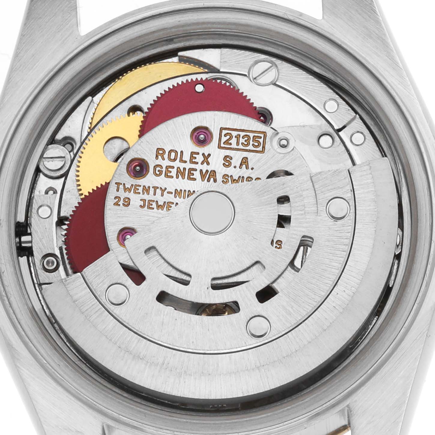 The image shows the movement of a Rolex Datejust 69173 Women's Steel and Gold (two tone) Grey Dial from the back, displaying gears and the rotor.