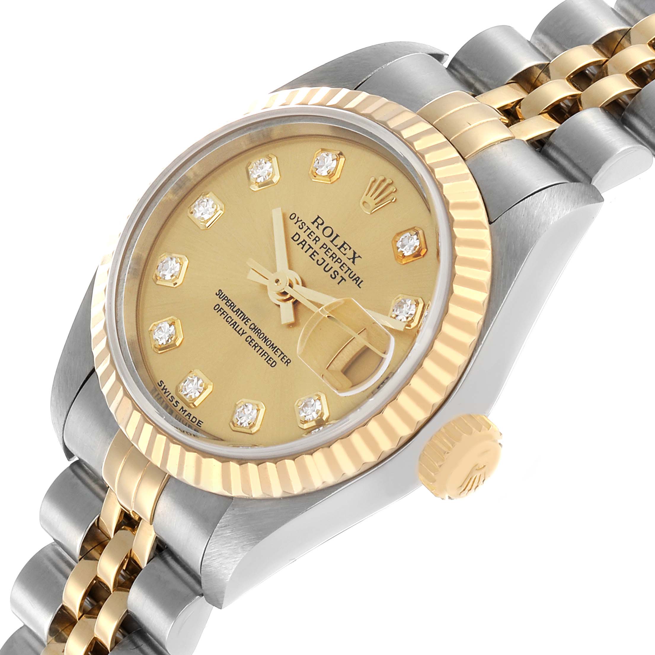 The Rolex Datejust 79173 Women's Steel and Gold (two tone) Champagne Dial watch is shown at an angled view highlighting the dial, bezel, crown, and bracelet.