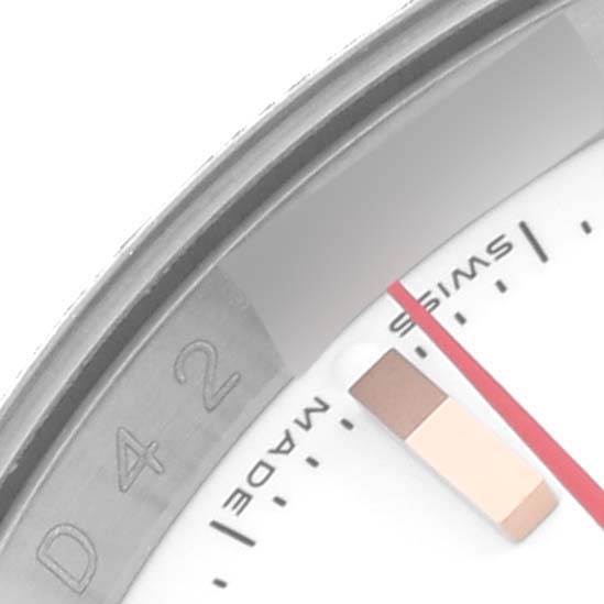 The image shows a close-up of the bezel and part of the dial of the Rolex Turn-o-Graph 116261 Men's Steel and Gold (two tone) White Dial 116261 Men's Steel and Gold (two tone) White Dial watch.