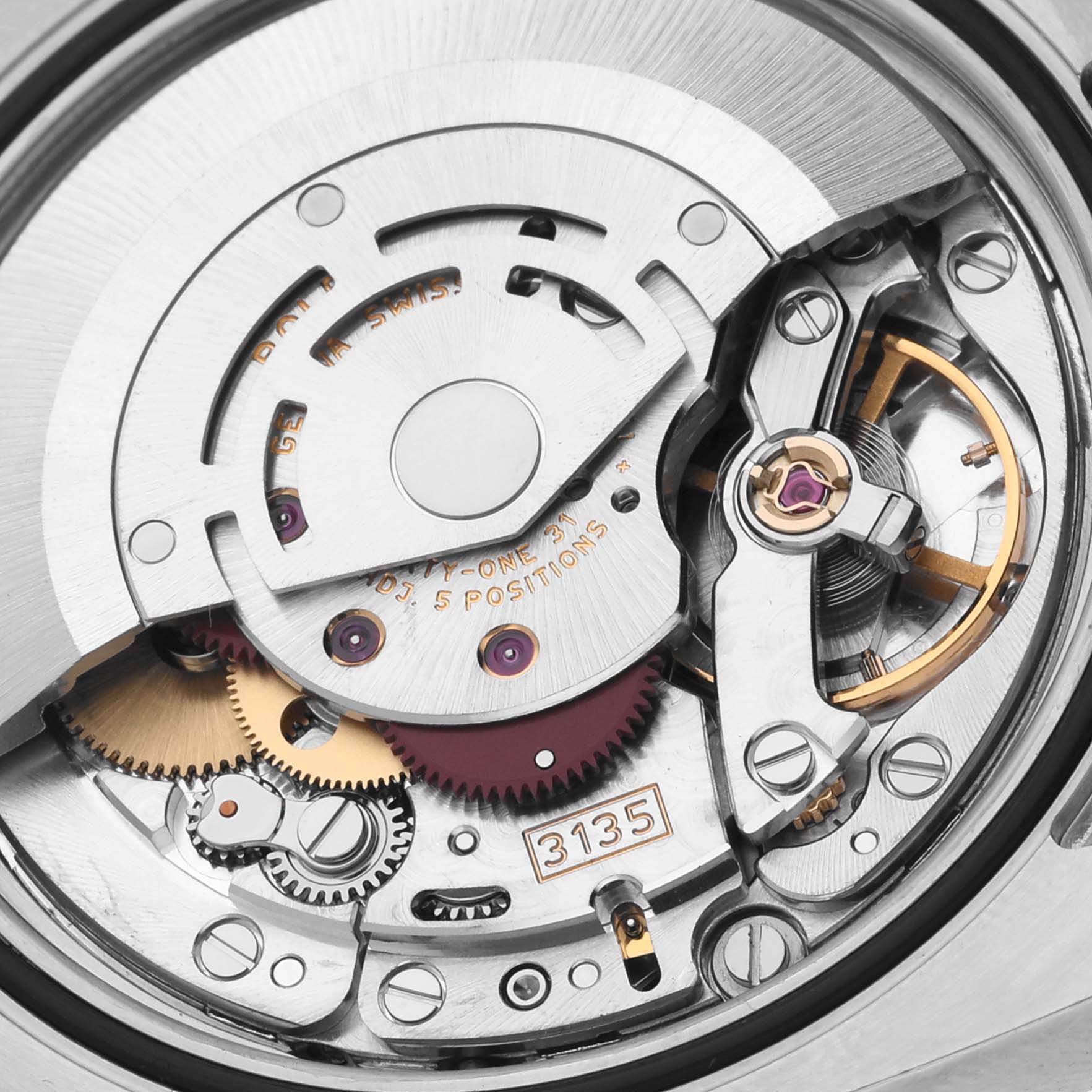 The image shows the internal mechanism of the Rolex Turn-o-Graph 116261 Men's Steel and Gold (two tone) White Dial 116261 Men's Steel and Gold (two tone) White Dial watch, focusing on gears and movement parts.