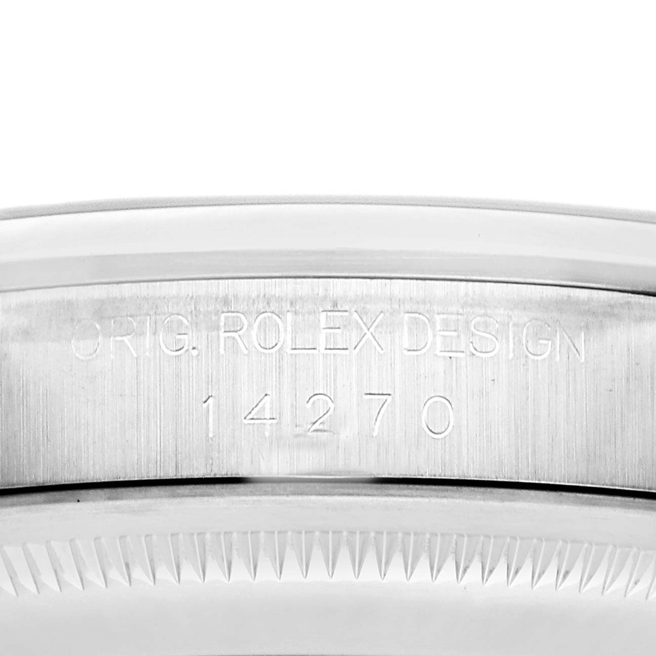 This image shows the side engraving of the Rolex Explorer 14270 Men's Stainless Steel Black Dial, highlighting the "Orig. Rolex Design" and model number 14270.