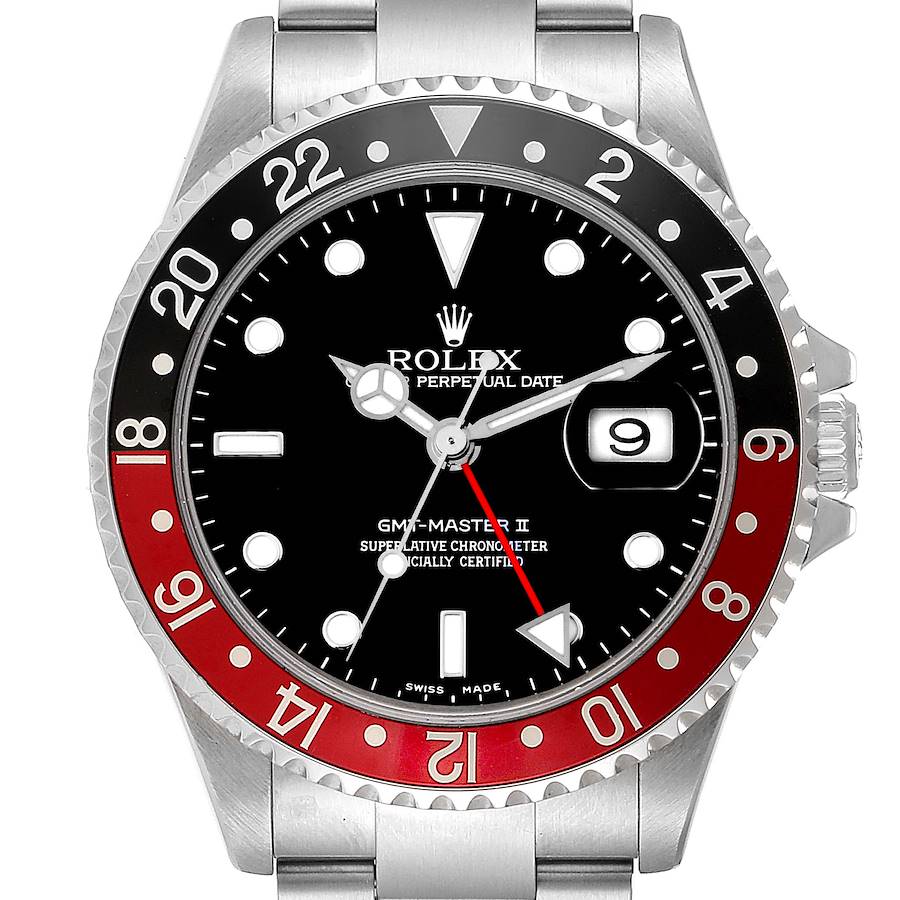 The Rolex GMT-Master watch is shown from a front angle, highlighting the bezel, dial, and date window.