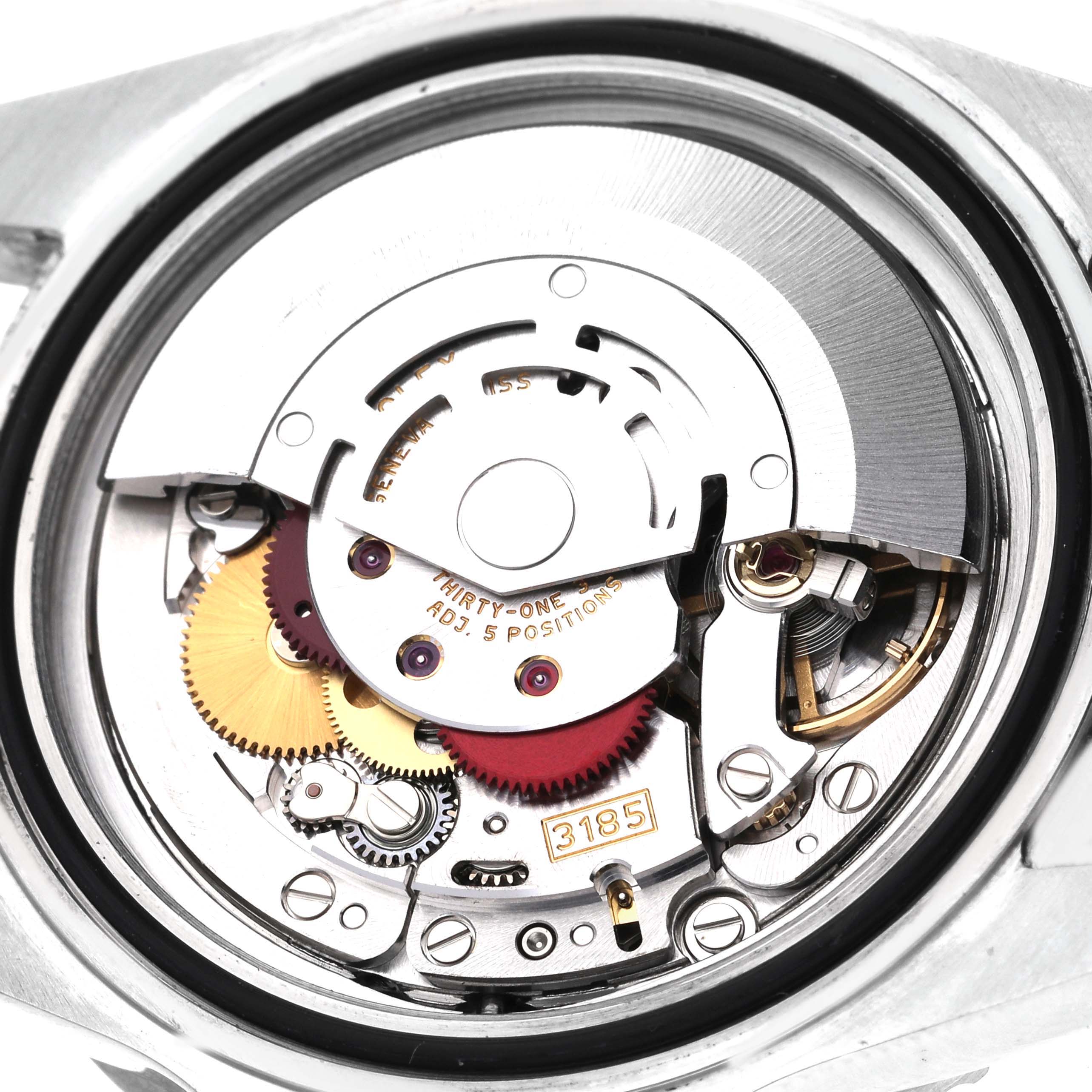 The image shows the internal movement of the Rolex GMT-Master 16710 Men
s Stainless Steel Black Dial 16710 Men
s Stainless Steel Black Dial watch from a top-down angle, highlighting gears and components.