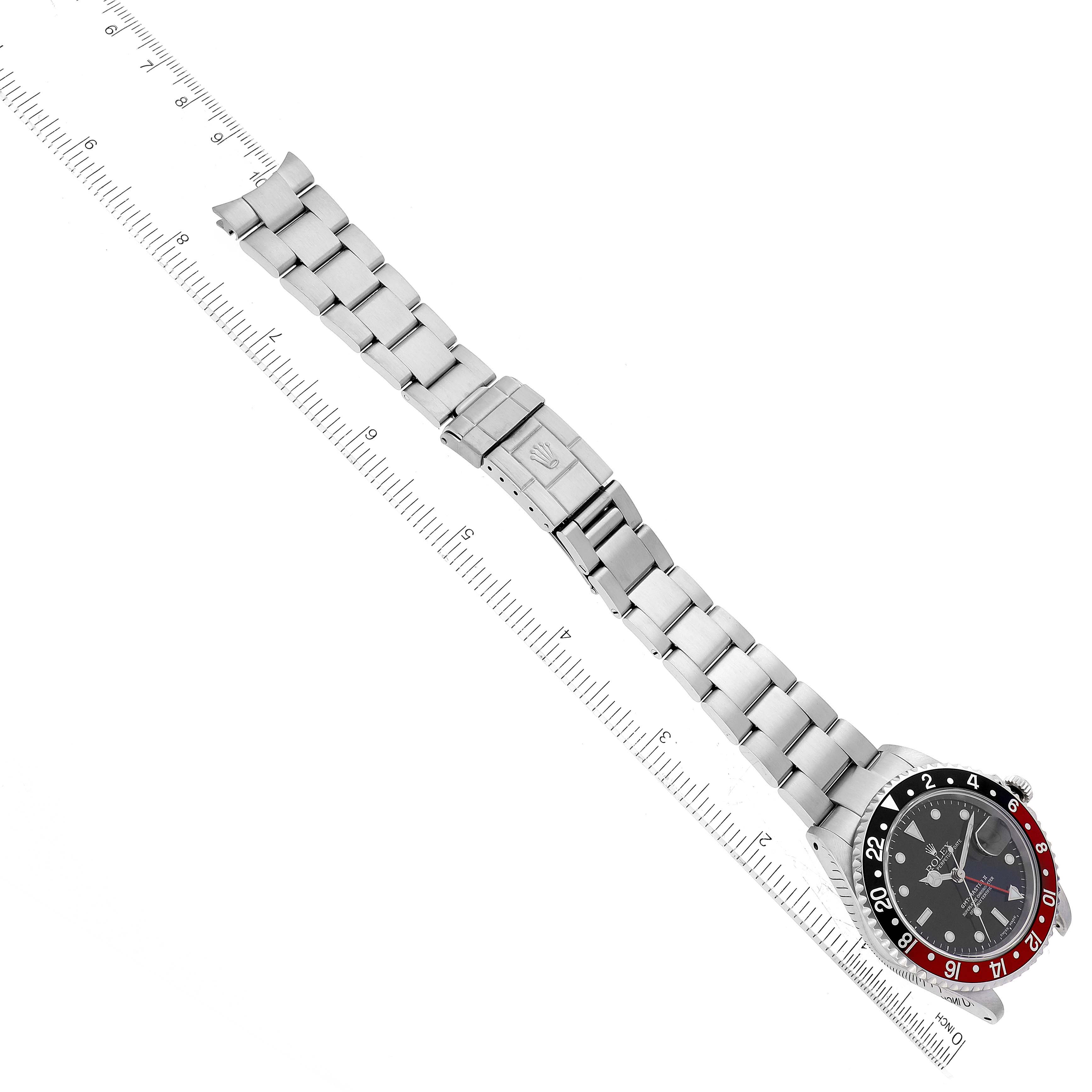 The image shows a Rolex GMT-Master 16710 Men's Stainless Steel Black Dial 16710 Men's Stainless Steel Black Dial watch laid flat, showcasing the bracelet, clasp, and face from an overhead perspective.