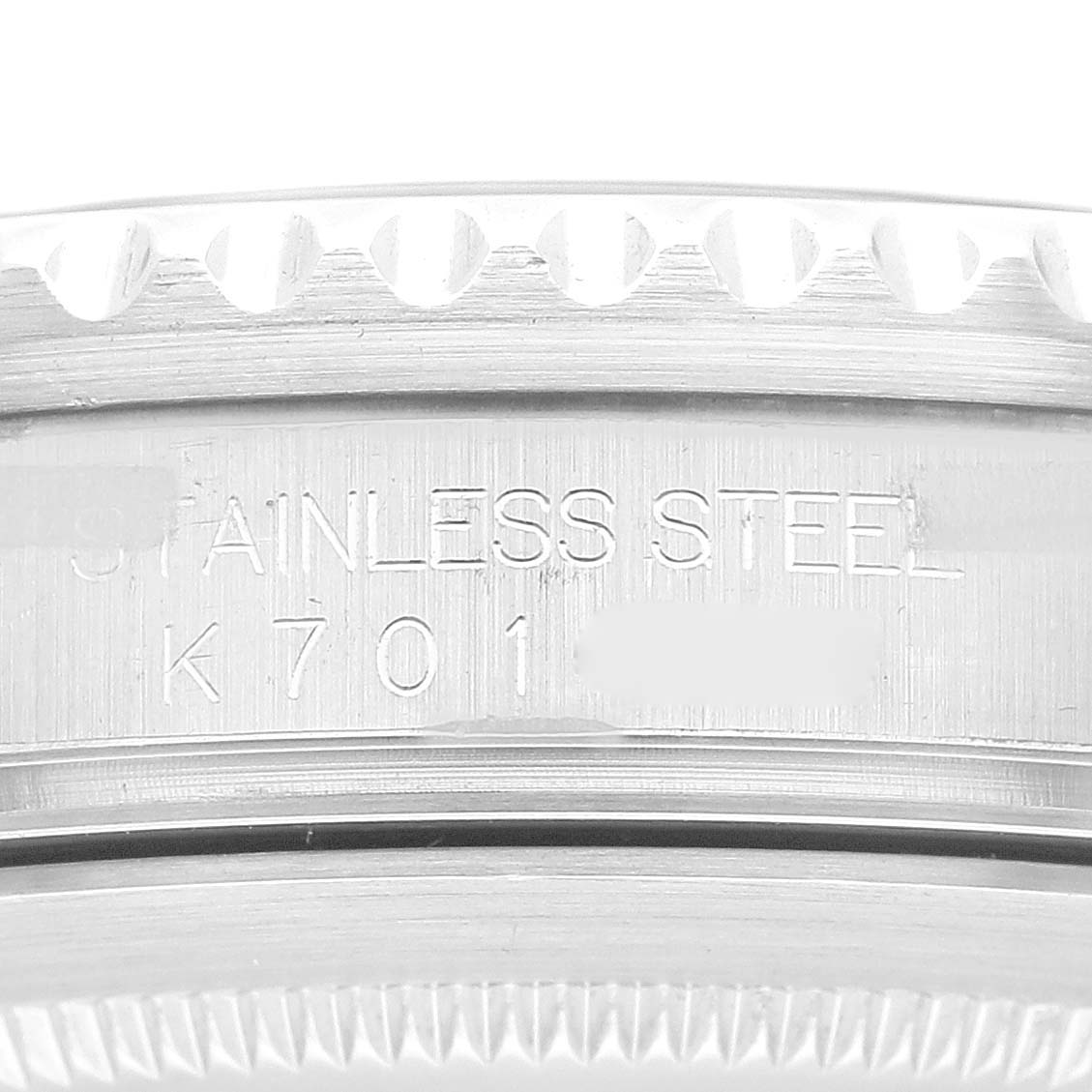 The image shows a close-up of the side of a stainless steel bezel and case of a Rolex GMT-Master 16710 Men
s Stainless Steel Black Dial 16710 Men
s Stainless Steel Black Dial watch.