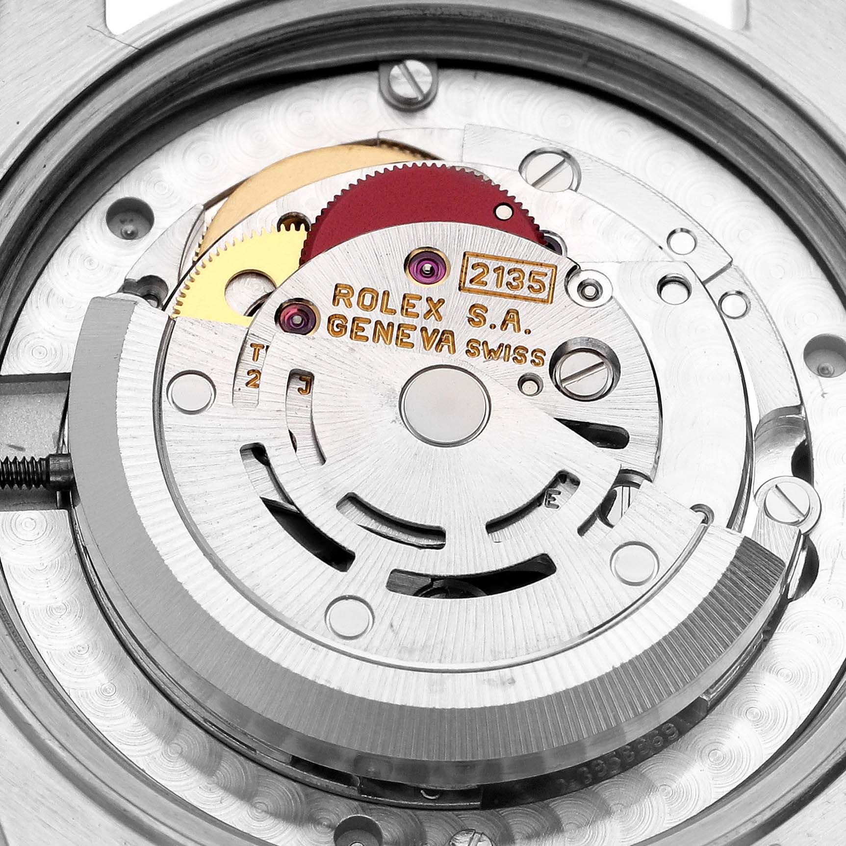 The image shows the movement mechanism of a Rolex Mid-Size 68240 Women's Stainless Steel Pink Dial 68240 Women's Stainless Steel Pink Dial watch from a top-down angle, highlighting its intricate components.