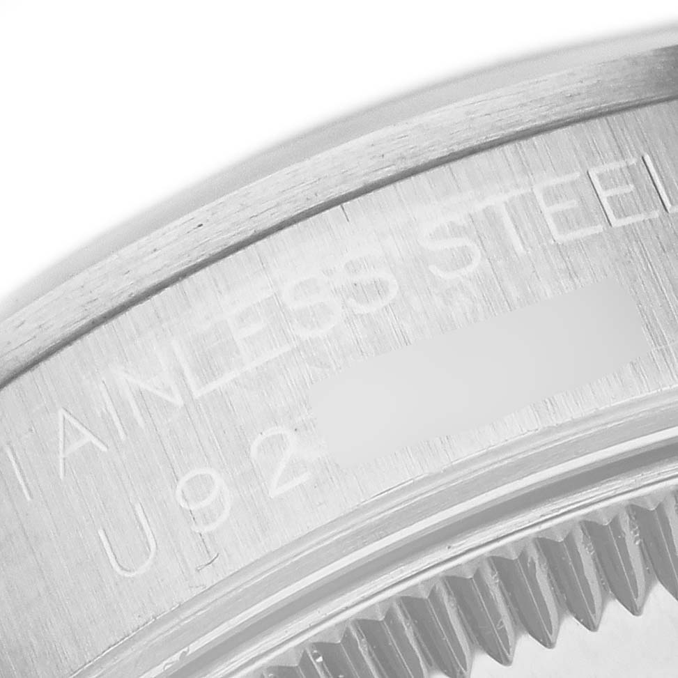 The image shows a close-up of the back side, focusing on the stainless steel case of the Rolex Mid-Size 68240 Women's Stainless Steel Pink Dial 68240 Women's Stainless Steel Pink Dial watch.