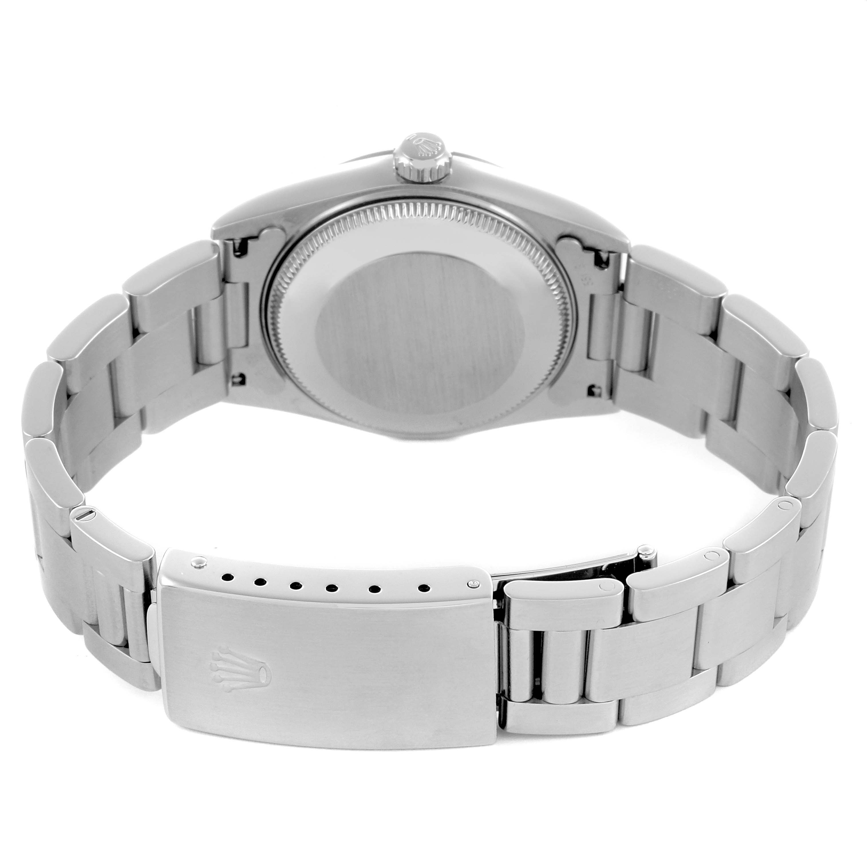 The image shows the back and bracelet of a Rolex Mid-Size 68240 Women's Stainless Steel Pink Dial 68240 Women's Stainless Steel Pink Dial watch from a rear angle.