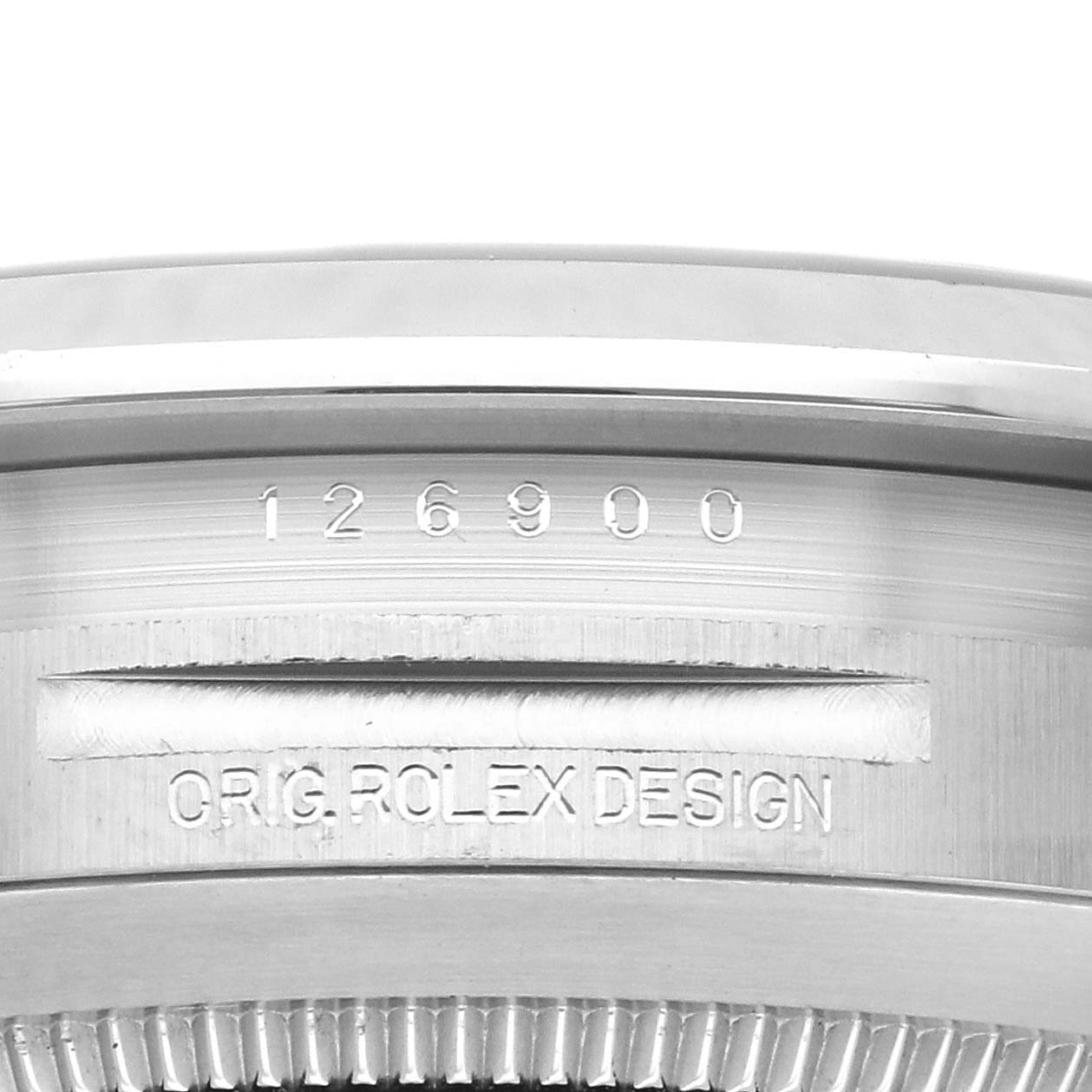 The image shows a close-up of the case side engraving on a Rolex Air-King 126900 Men's Stainless Steel Black Dial 126900 Men's Stainless Steel Black Dial, displaying the model number and "ORIG ROLEX DESIGN."