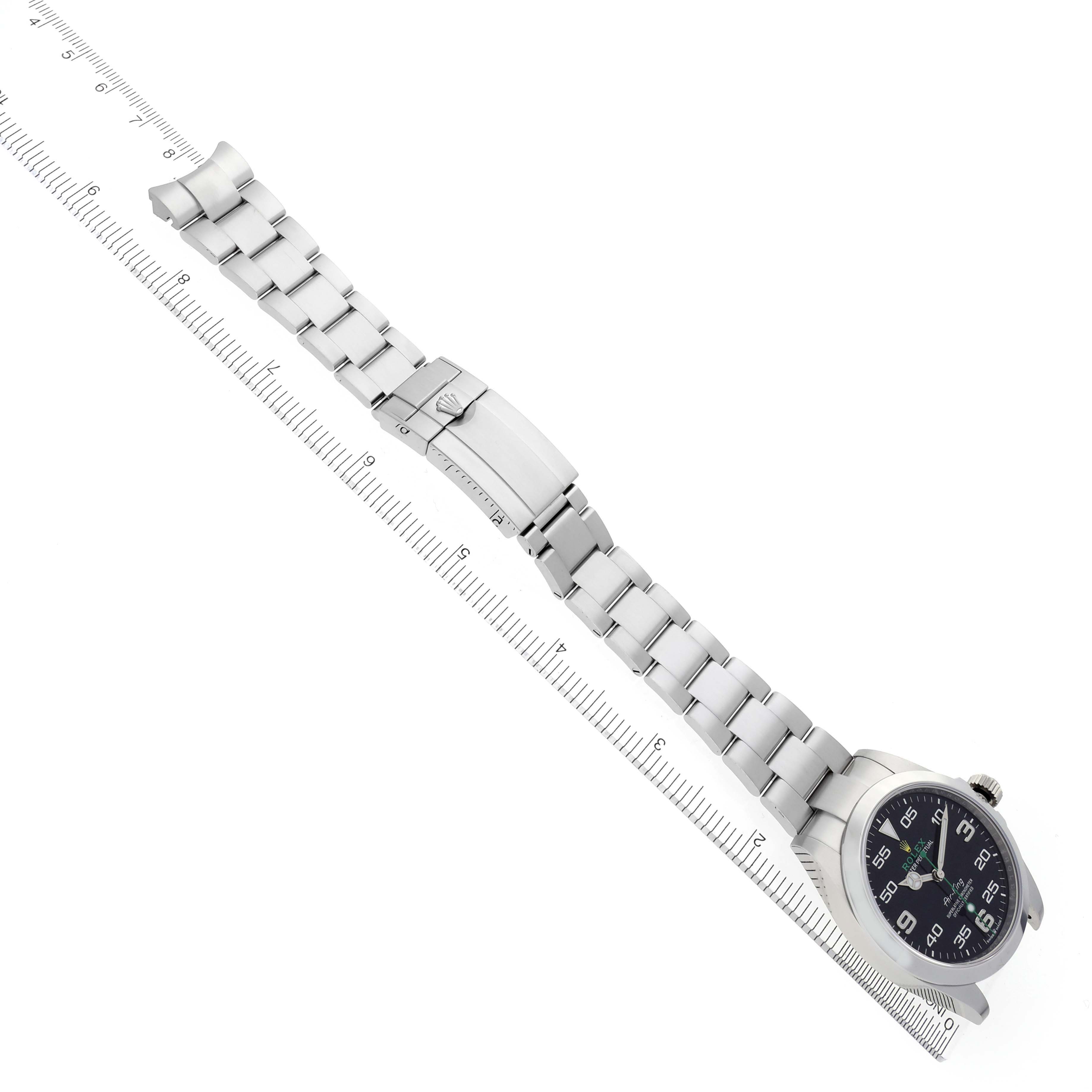 The Rolex Air-King 126900 Men's Stainless Steel Black Dial 126900 Men's Stainless Steel Black Dial watch is shown at a slight diagonal, displaying the face, bracelet, and clasp.