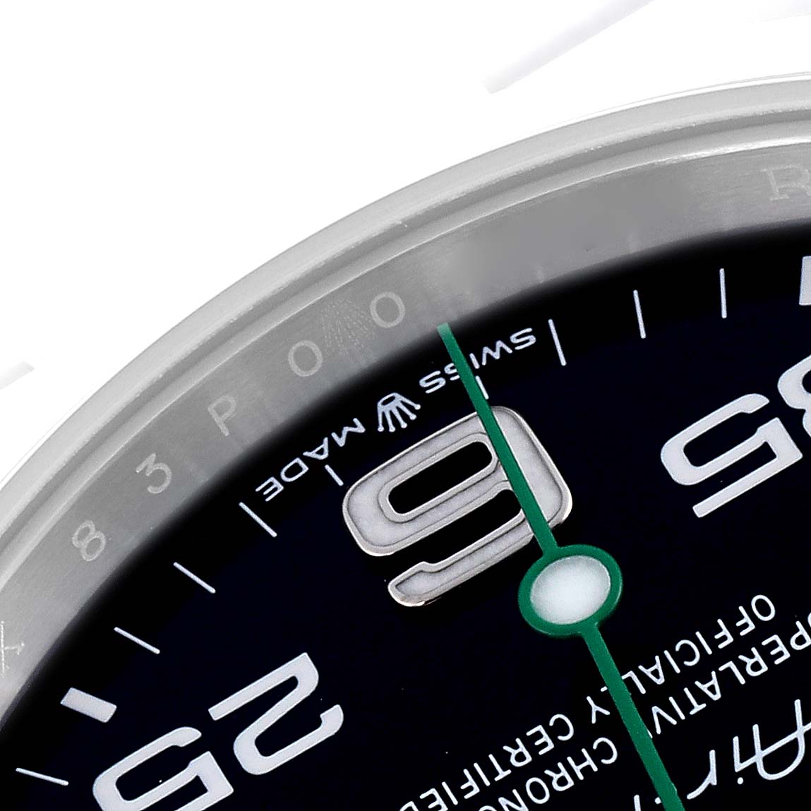 The image shows a close-up of the dial and bezel of the Rolex Air-King 126900 Men's Stainless Steel Black Dial 126900 Men's Stainless Steel Black Dial, focusing on the numbers and part of the second hand.