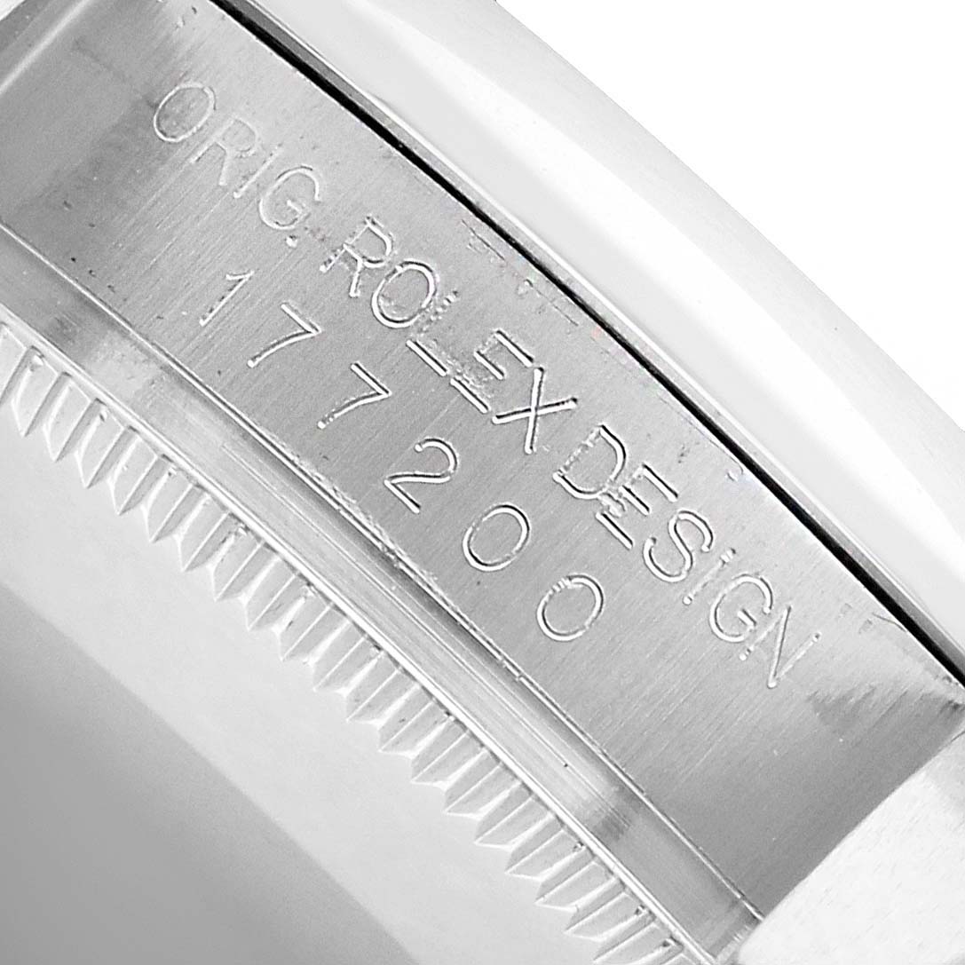 The image shows a close-up of the edge and serial engraving on a Rolex Mid-Size 177200 Women's Stainless Steel Blue Dial watch case.