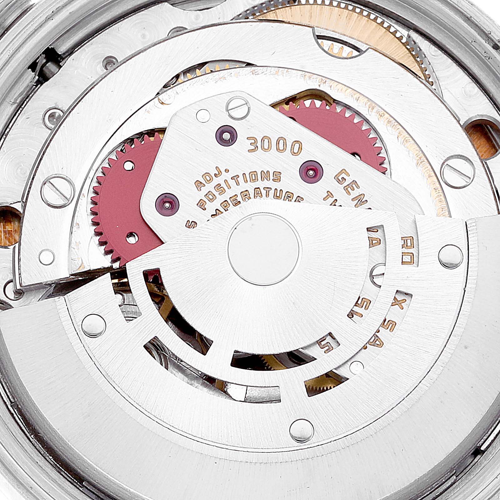 This image shows the intricate inner mechanism of the Rolex Oyster Perpetual 14233 Men
s Steel and Gold (two tone) Champagne Dial 14233 Men
s Steel and Gold (two tone) Champagne Dial watch, specifically the movement and gears.