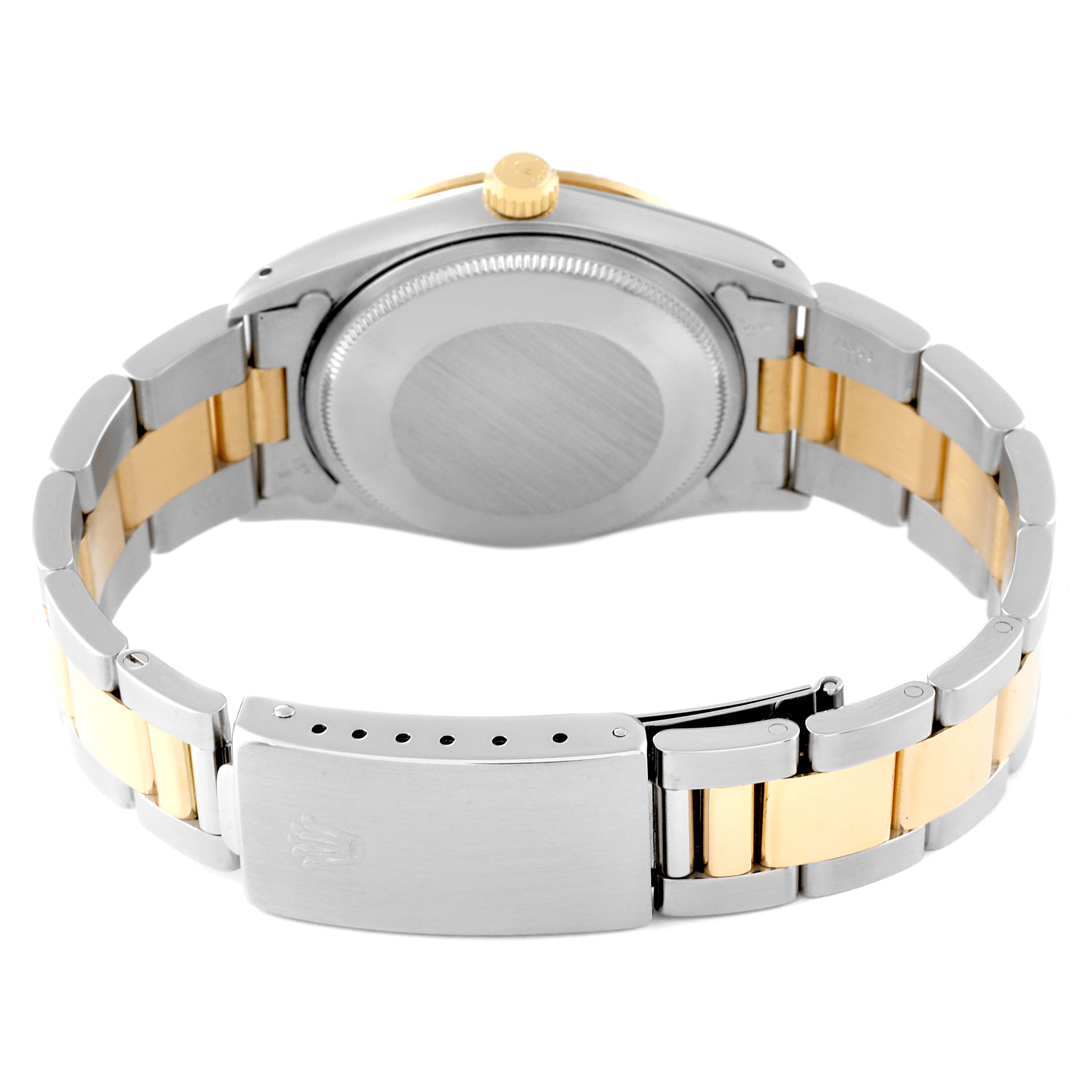 The image shows the back view of a Rolex Oyster Perpetual 14233 Men
s Steel and Gold (two tone) Champagne Dial 14233 Men
s Steel and Gold (two tone) Champagne Dial watch, focusing on its two-tone bracelet and case back.