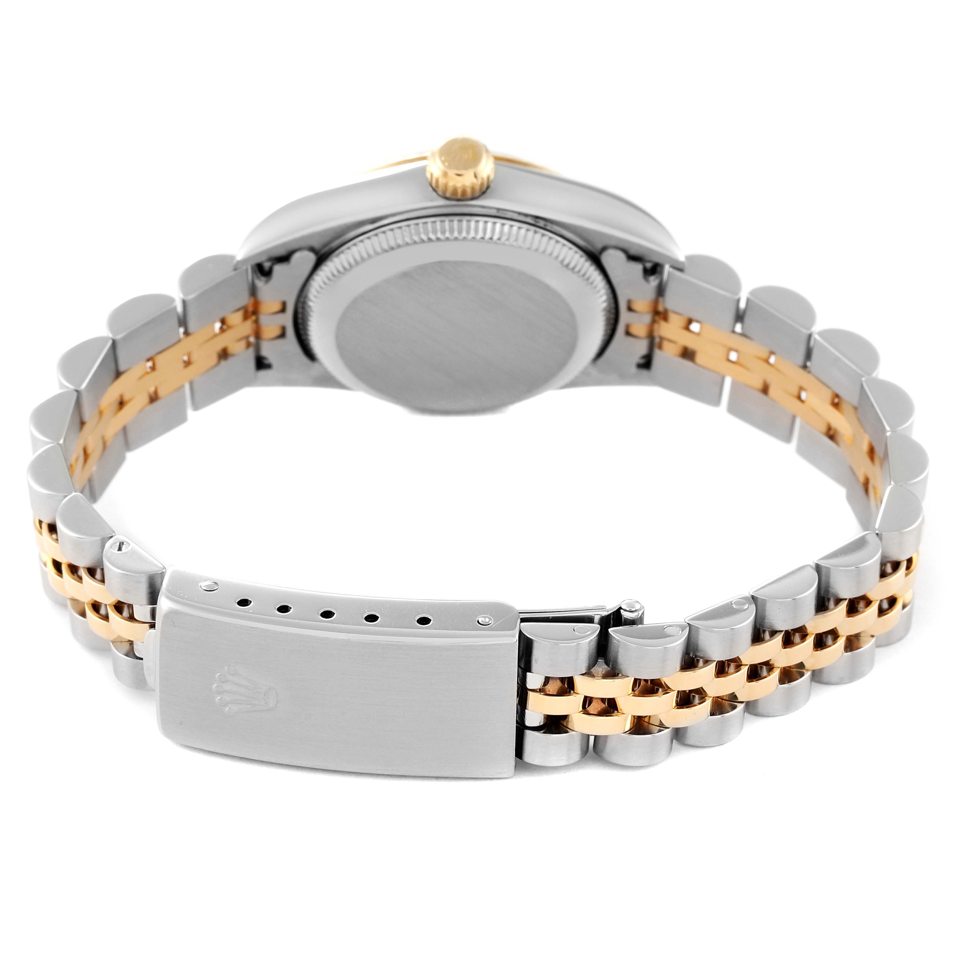 This image shows the Oyster Perpetual Rolex watch from the back, highlighting the case, crown, and bracelet clasp.