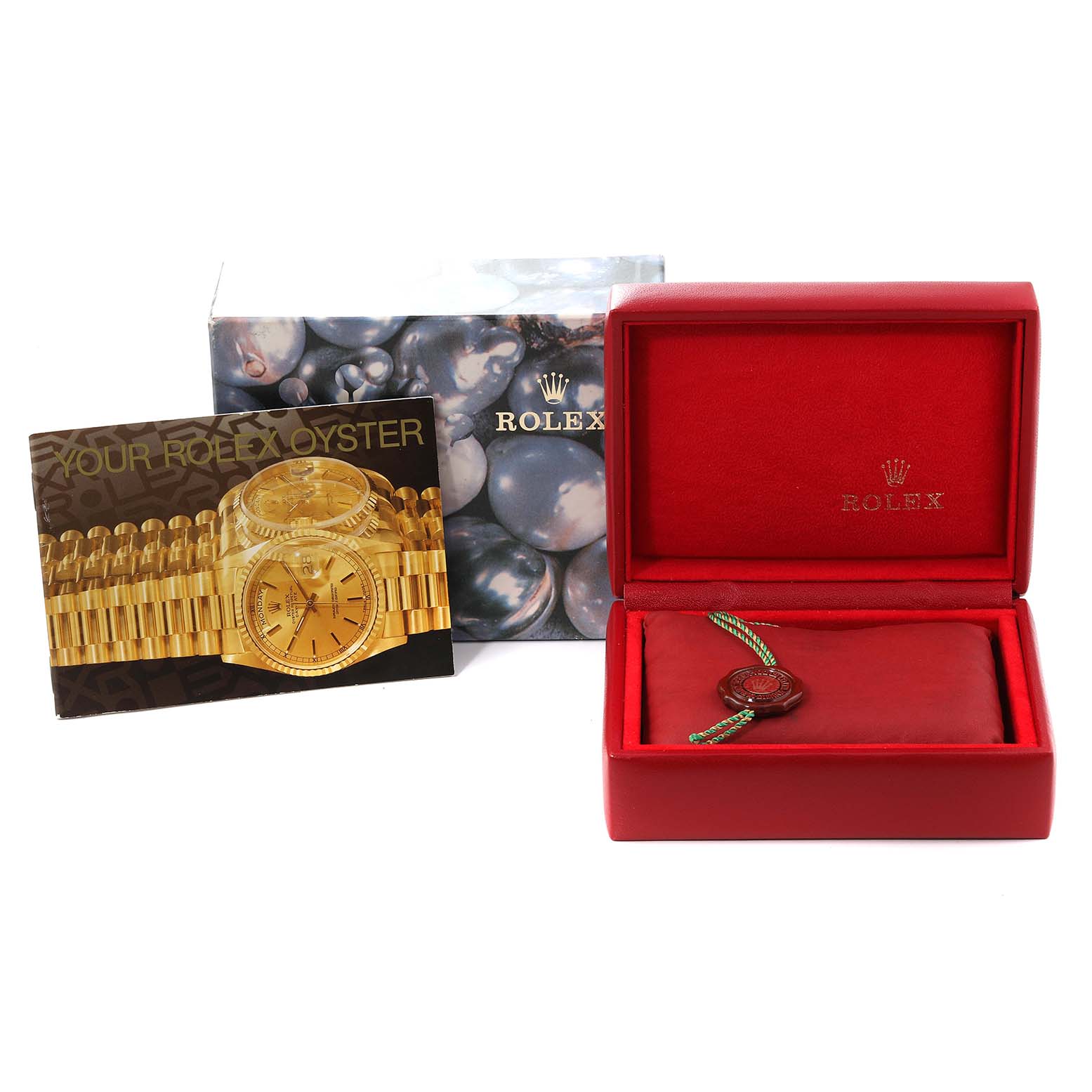 The image shows the box, manual, and accessories for a Rolex Oyster Perpetual 76193 Women's Steel and Gold (two tone) Black Dial 76193 Women's Steel and Gold (two tone) Black Dial watch, with the box open and empty.
