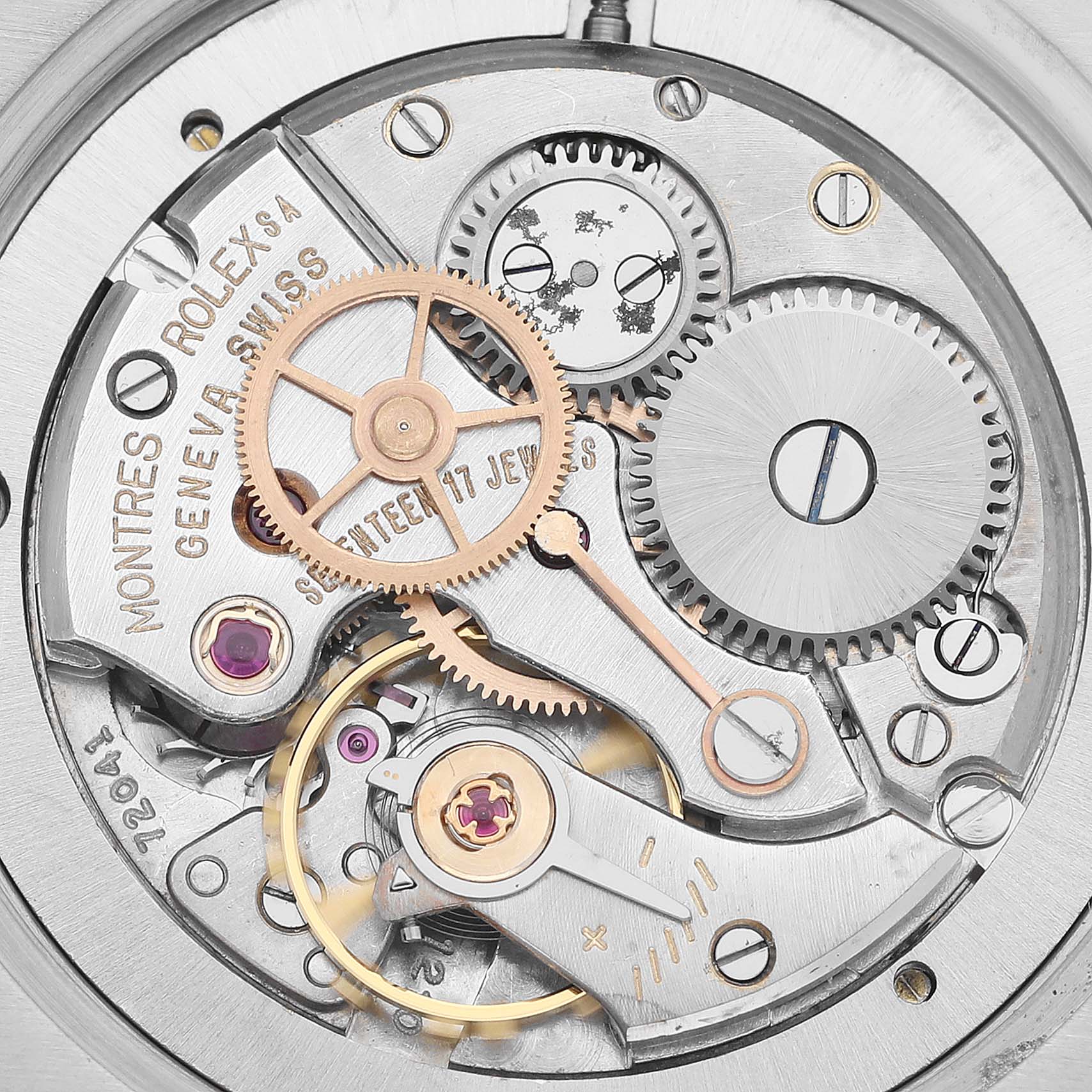 The image shows a close-up view of the internal movement mechanism of a Rolex Vintage Collection 6694 Men's Stainless Steel Black Dial 6694 Men's Stainless Steel Black Dial watch.