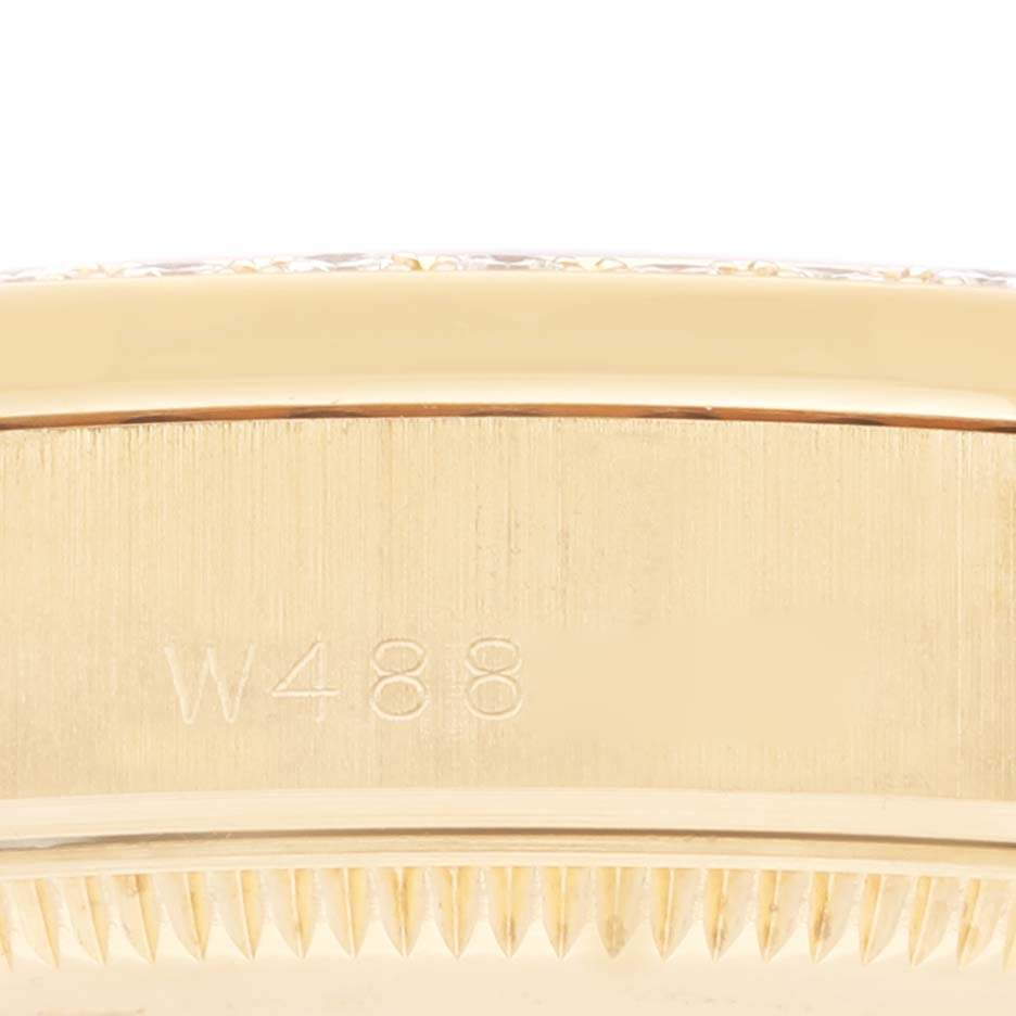 This image shows a close-up of the side of the President model by Rolex, highlighting the engravings and part of the bezel.