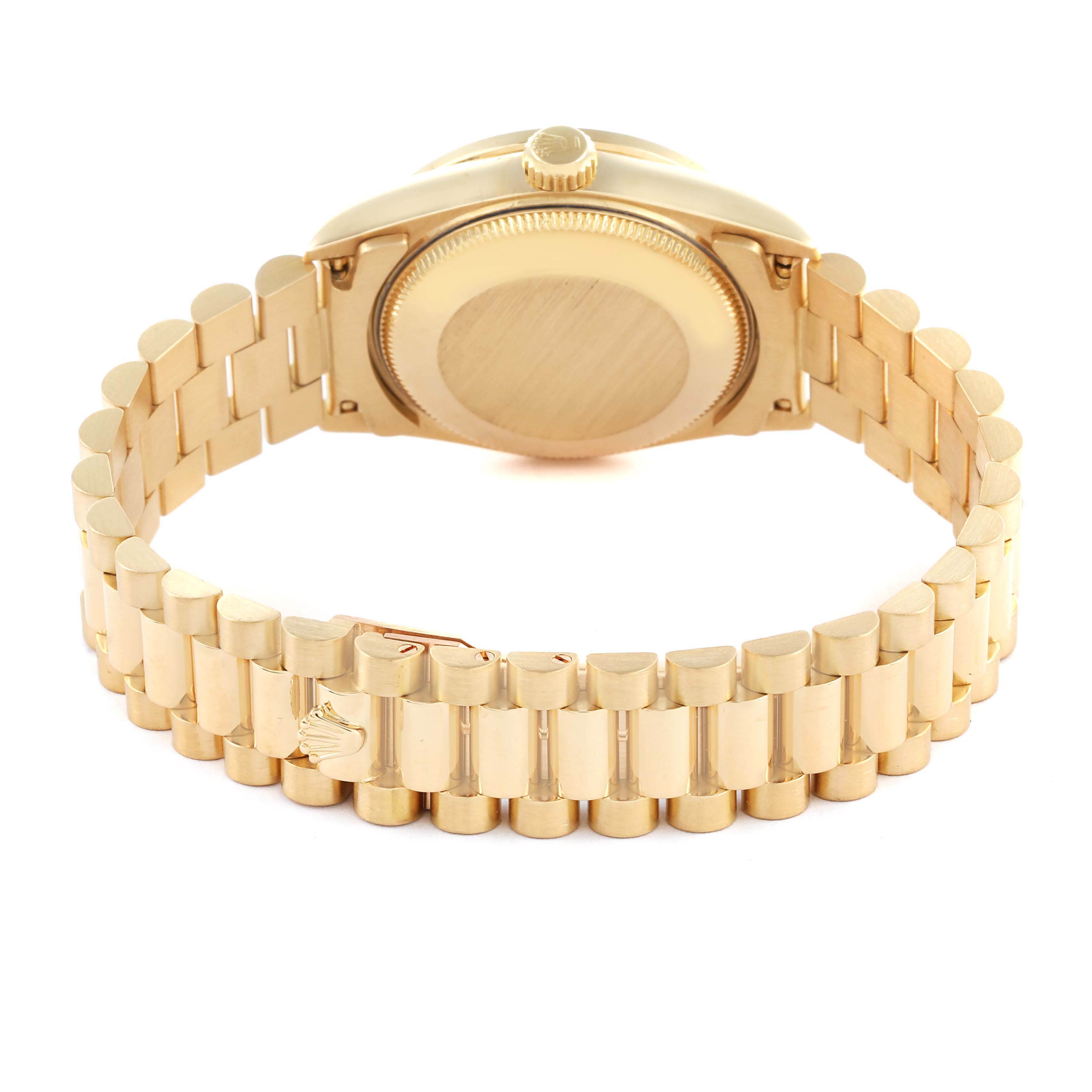 The Rolex Mid-Size 68288 Women's Yellow Gold Champagne Dial 68288 Women's Yellow Gold Champagne Dial watch is shown from the back, featuring a gold bracelet and the case back.