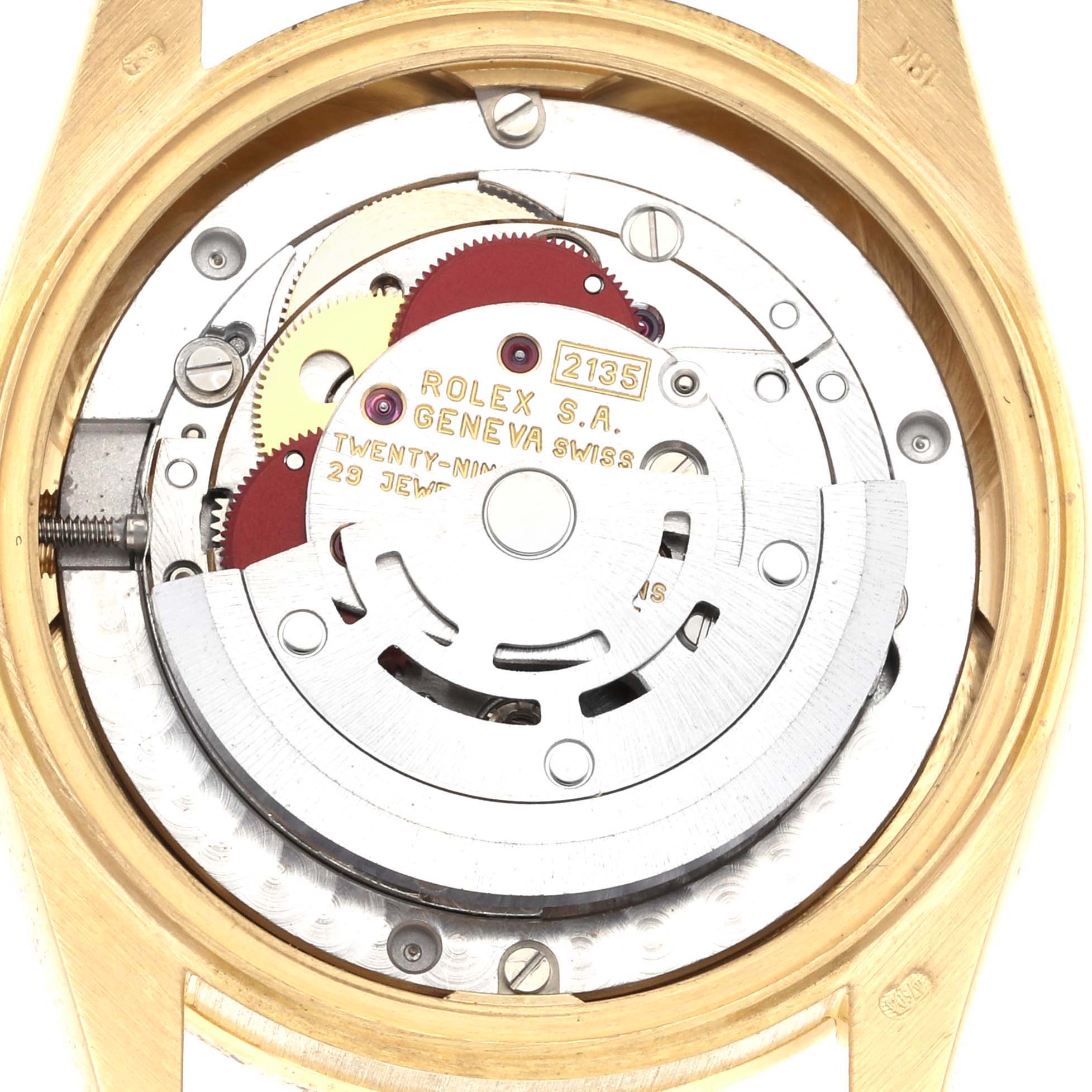 The image shows the inner mechanism of a Rolex Mid-Size 68288 Women's Yellow Gold Champagne Dial 68288 Women's Yellow Gold Champagne Dial model from a top-down angle, revealing the movement and gears.