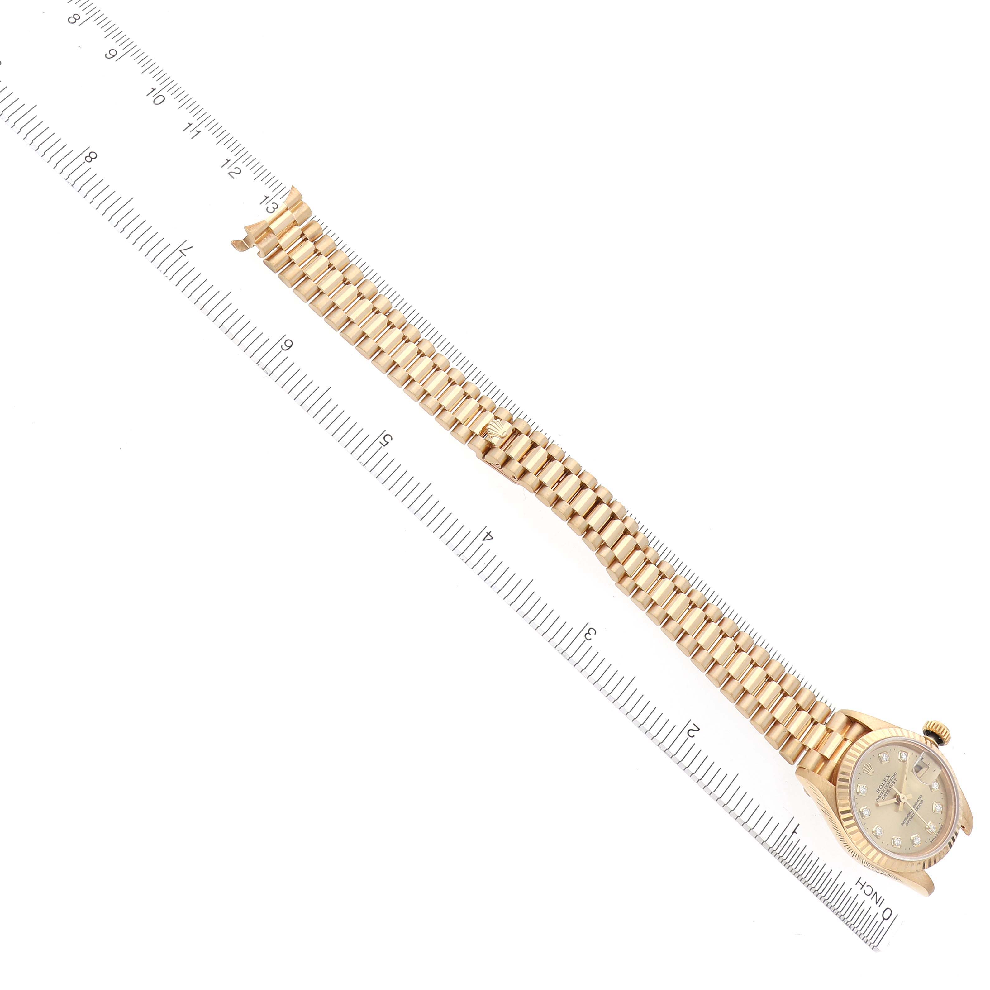 The Rolex Datejust 69178 Women's Yellow Gold Champagne Dial 69178 Women's Yellow Gold Champagne Dial watch is shown diagonally, displaying the full bracelet and partial face.