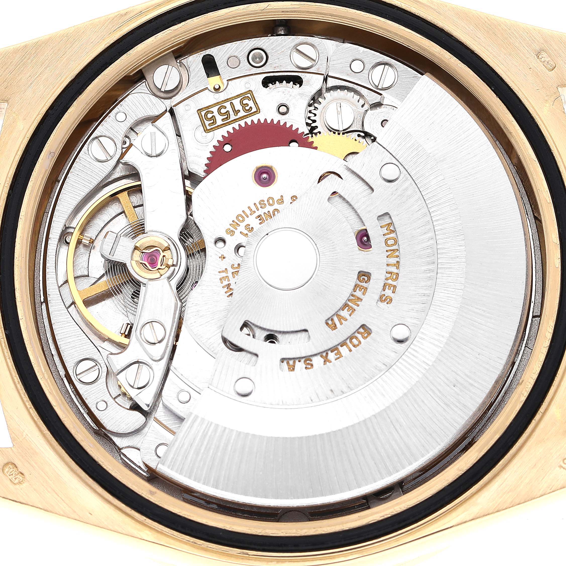 This image shows the intricate movement and mechanism of the Rolex President 18348 Men
s Yellow Gold Champagne Dial 18348 Men
s Yellow Gold Champagne Dial model watch from a top-down angle.
