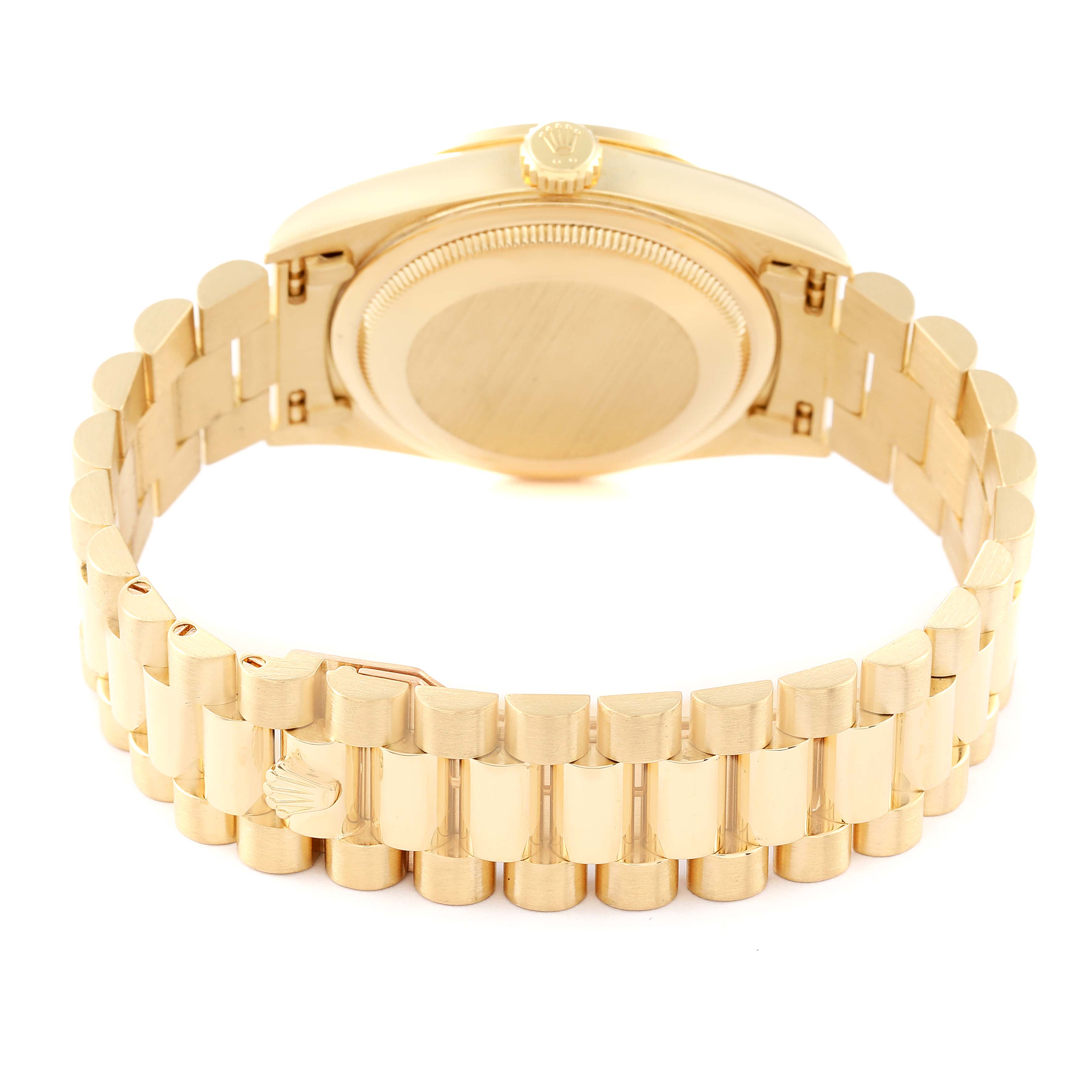 The image shows the back and bracelet of a Rolex President 18348 Men
s Yellow Gold Champagne Dial 18348 Men
s Yellow Gold Champagne Dial model watch at an angle, highlighting the crown emblem and clasp.