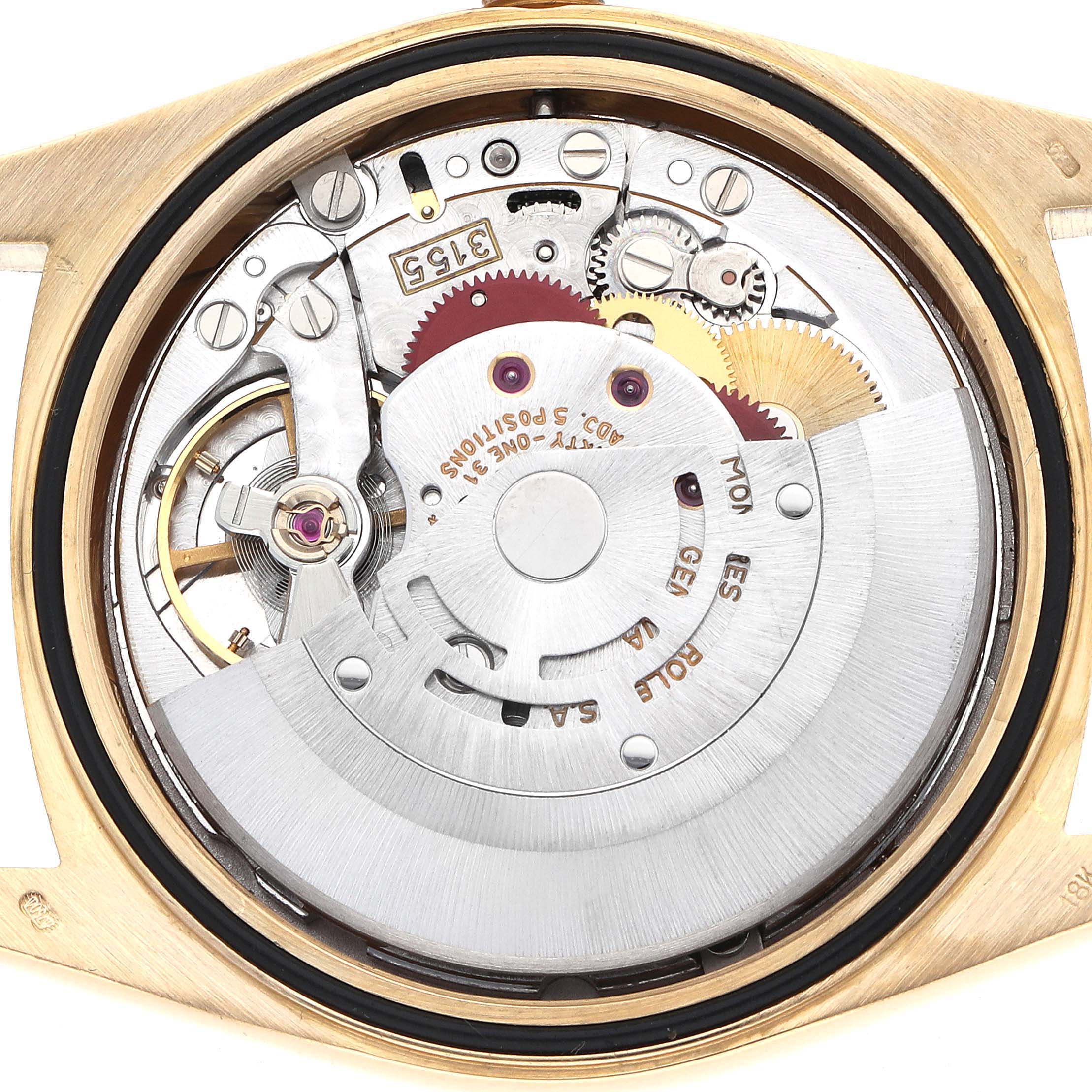 The image shows the back view of a Rolex President 18238 Men's Yellow Gold Champagne Dial model, highlighting its detailed movement and inner mechanics.